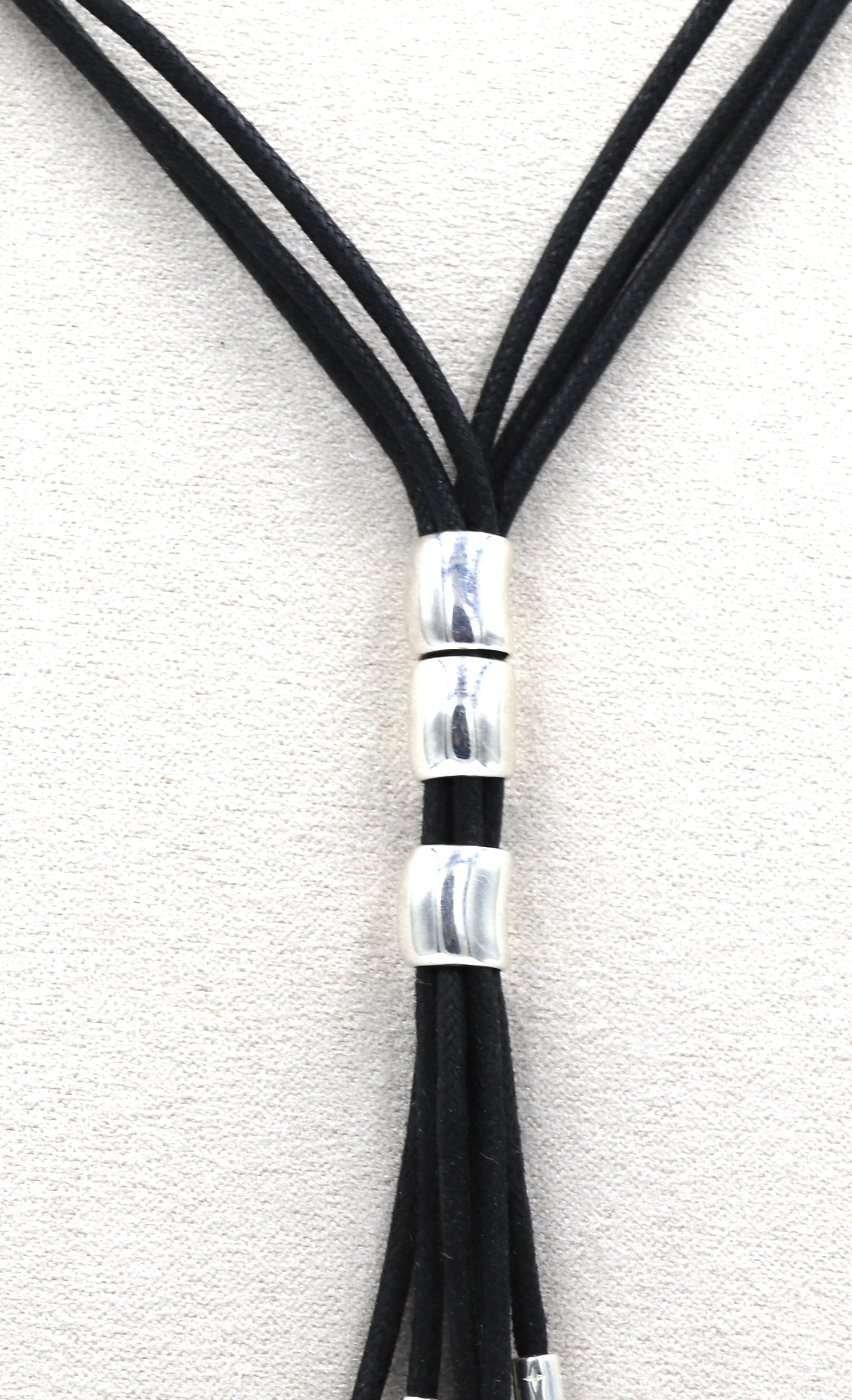 925 Sterling silver signed tear drop pendant on multi strand black cord necklace