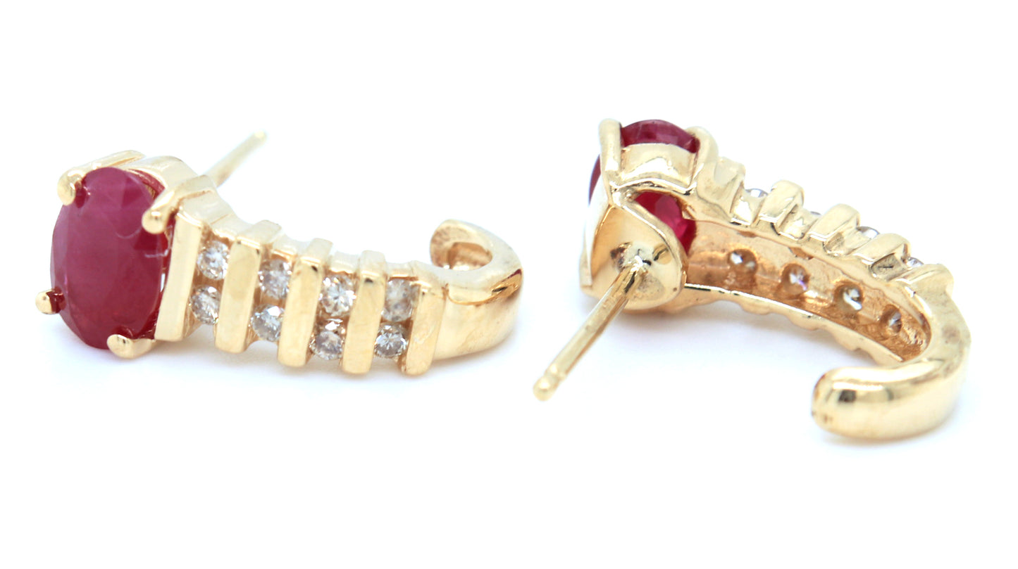 14kt Yellow gold oval ruby and diamond accent earrings