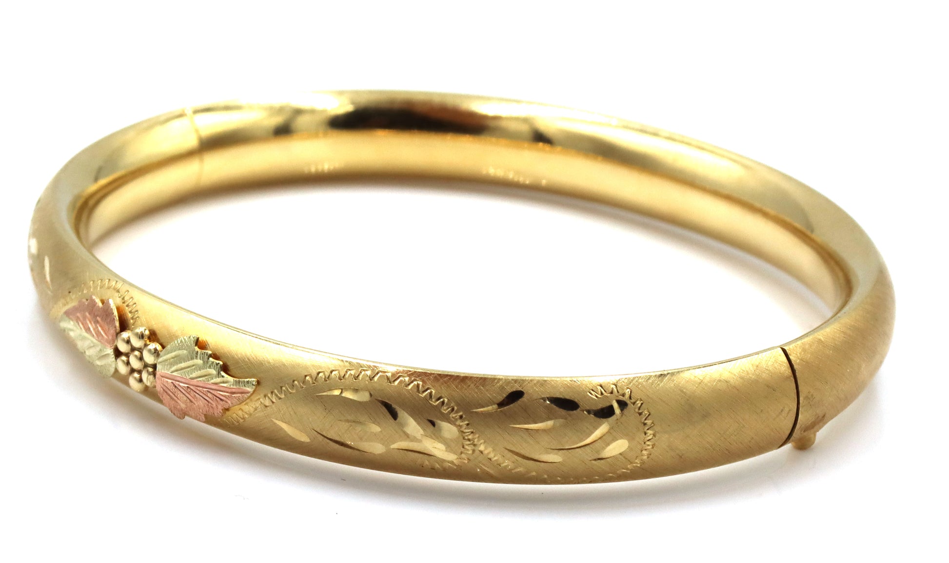 Gold plated flower engraved bangle bracelet
