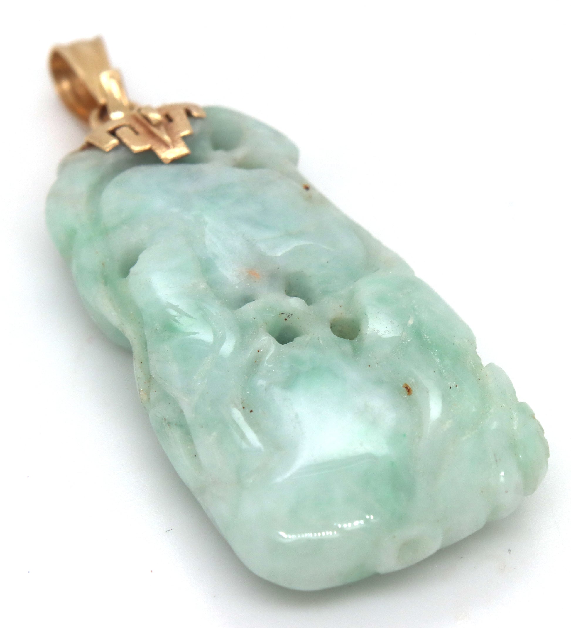 Hand carved green Jade pendant in 14kt yellow gold