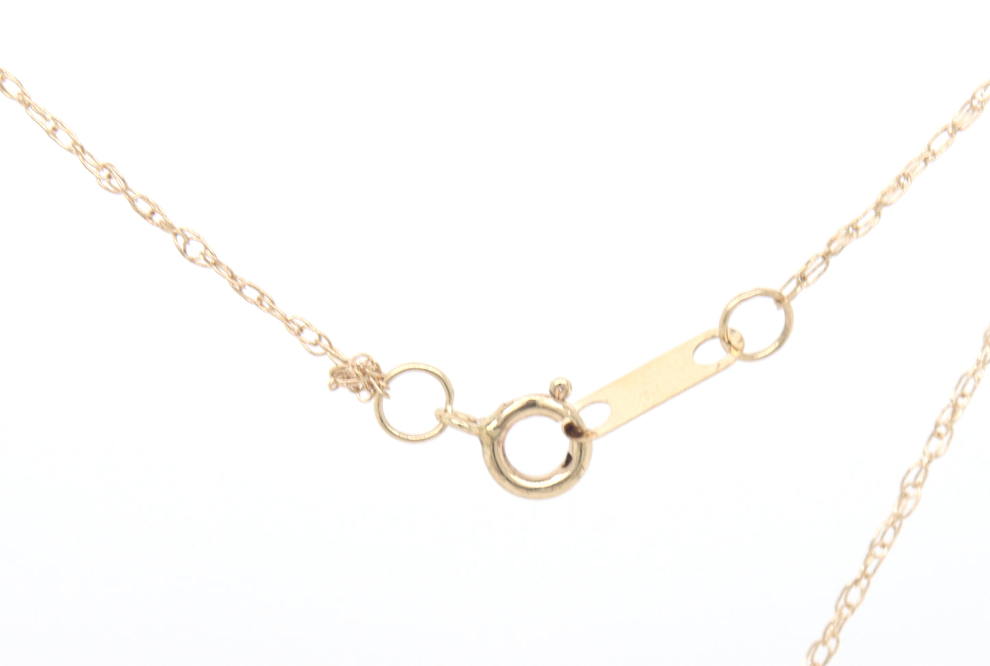 10kt Yellow gold 0.20ctw 3 stone diamond bar pendant on chain