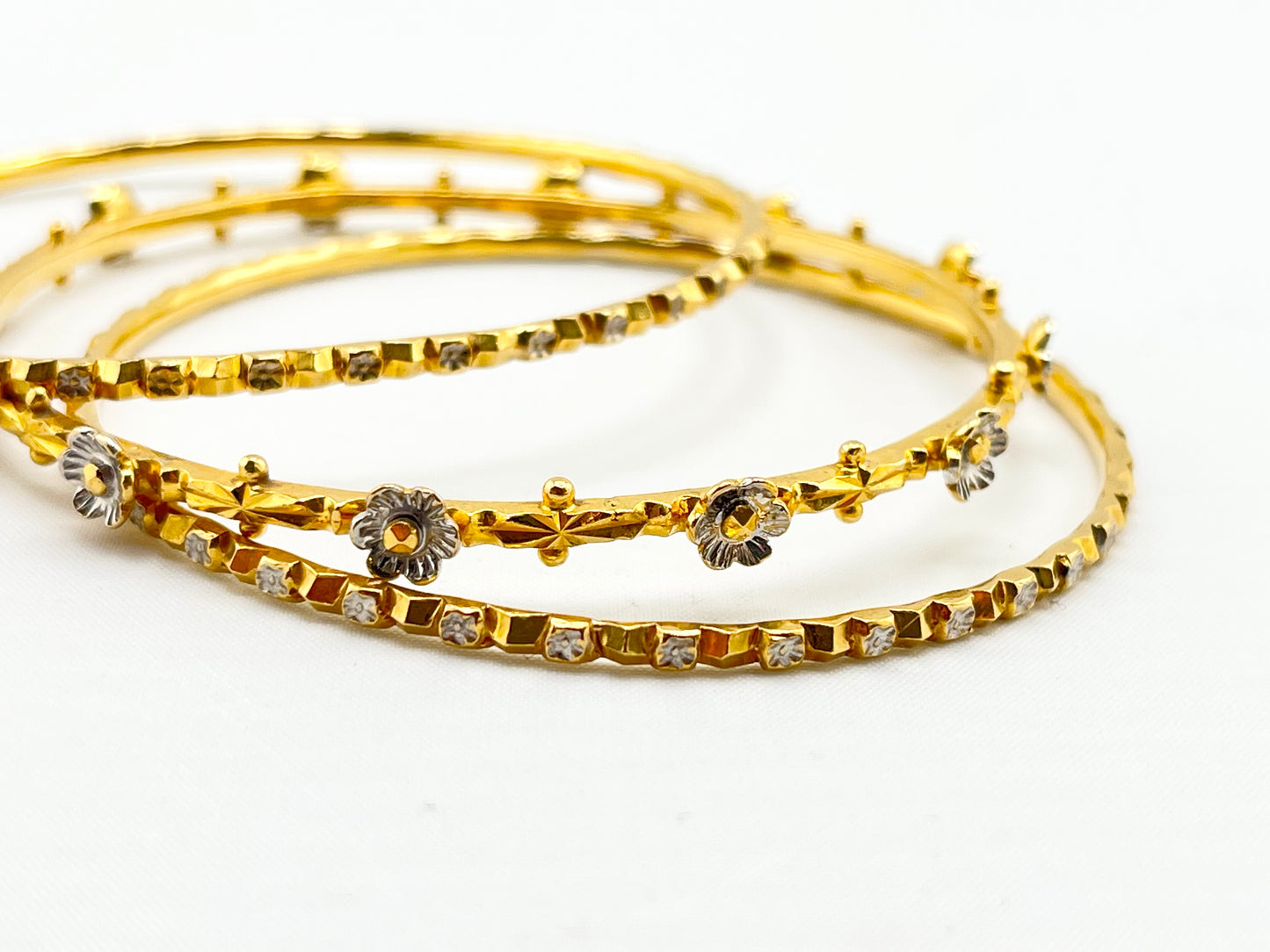 22KT Yellow Gold Hand Made Set Of Three Gold And White Flower Motifs Bangles