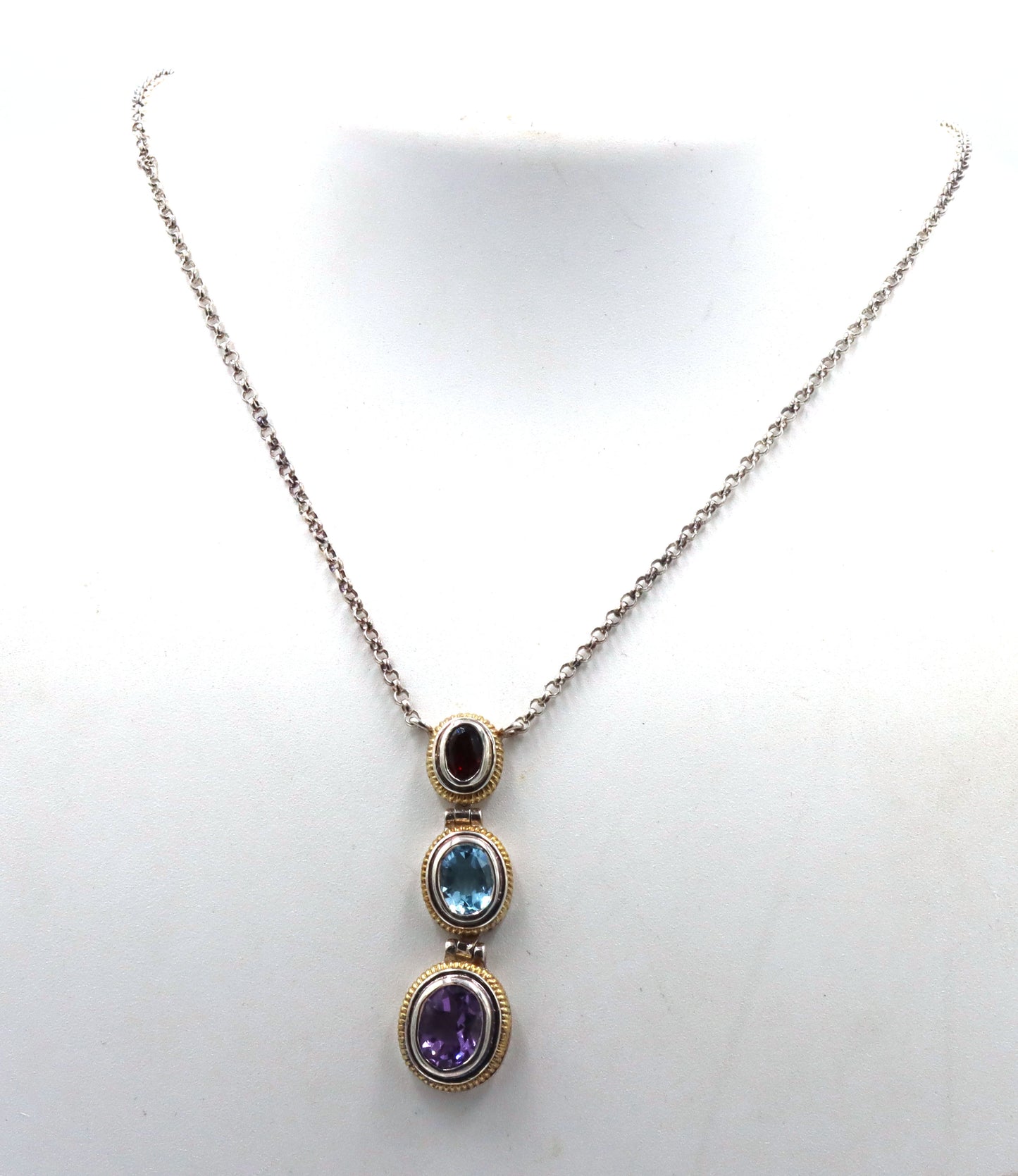 925 Sterling silver signed amethyst, blue topaz and garnet pendant on chain