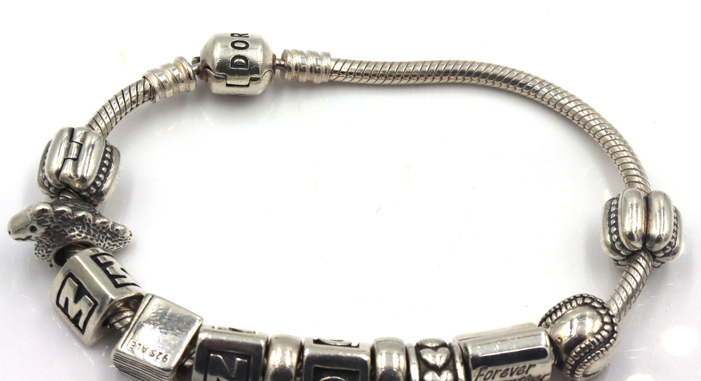Pandora bracelet with charms in 925 sterling silver