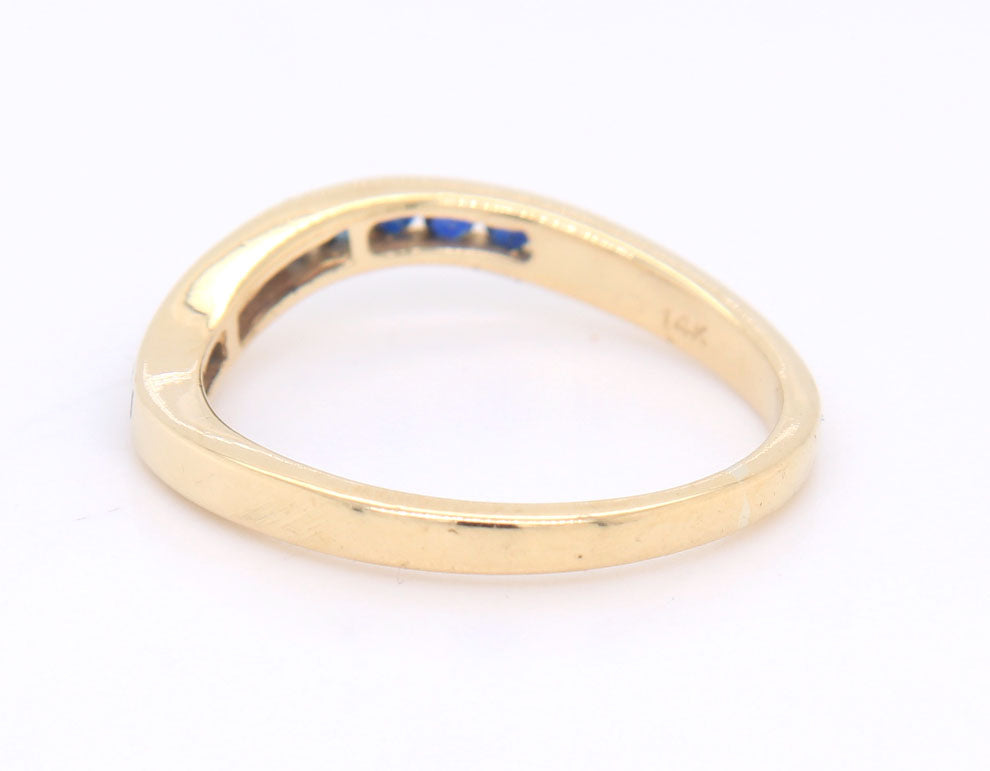 14kt Yellow gold blue sapphire curved band