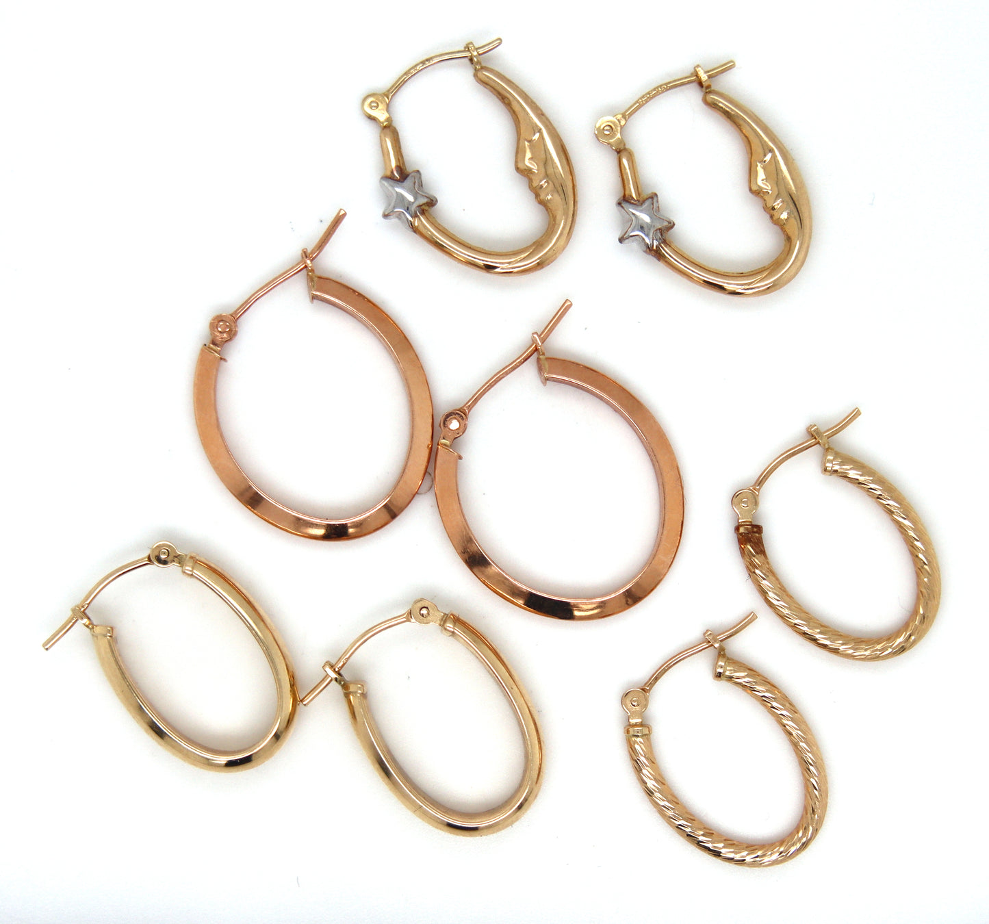 4 Pairs of 14kt yellow gold hoop earrings