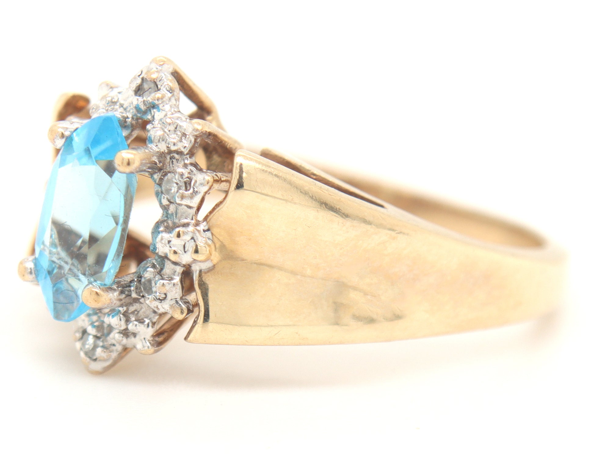 10kt Yellow gold blue topaz and diamond ring