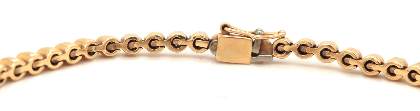 14kt Yellow gold round brilliant cut blue sapphire and diamond link bracelet