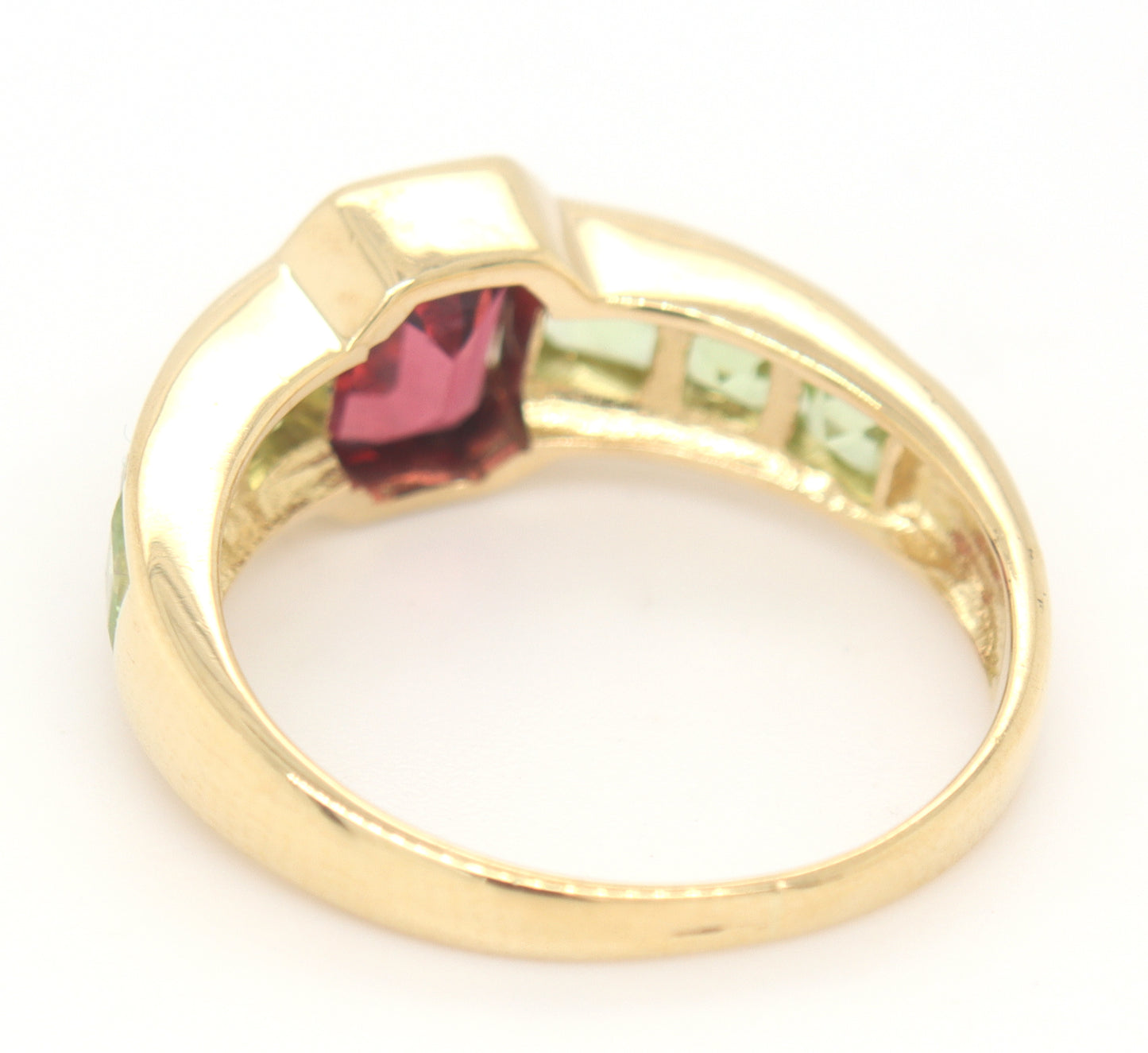 18kt Yellow gold Emerald cut garnet and square peridot bezel set ring