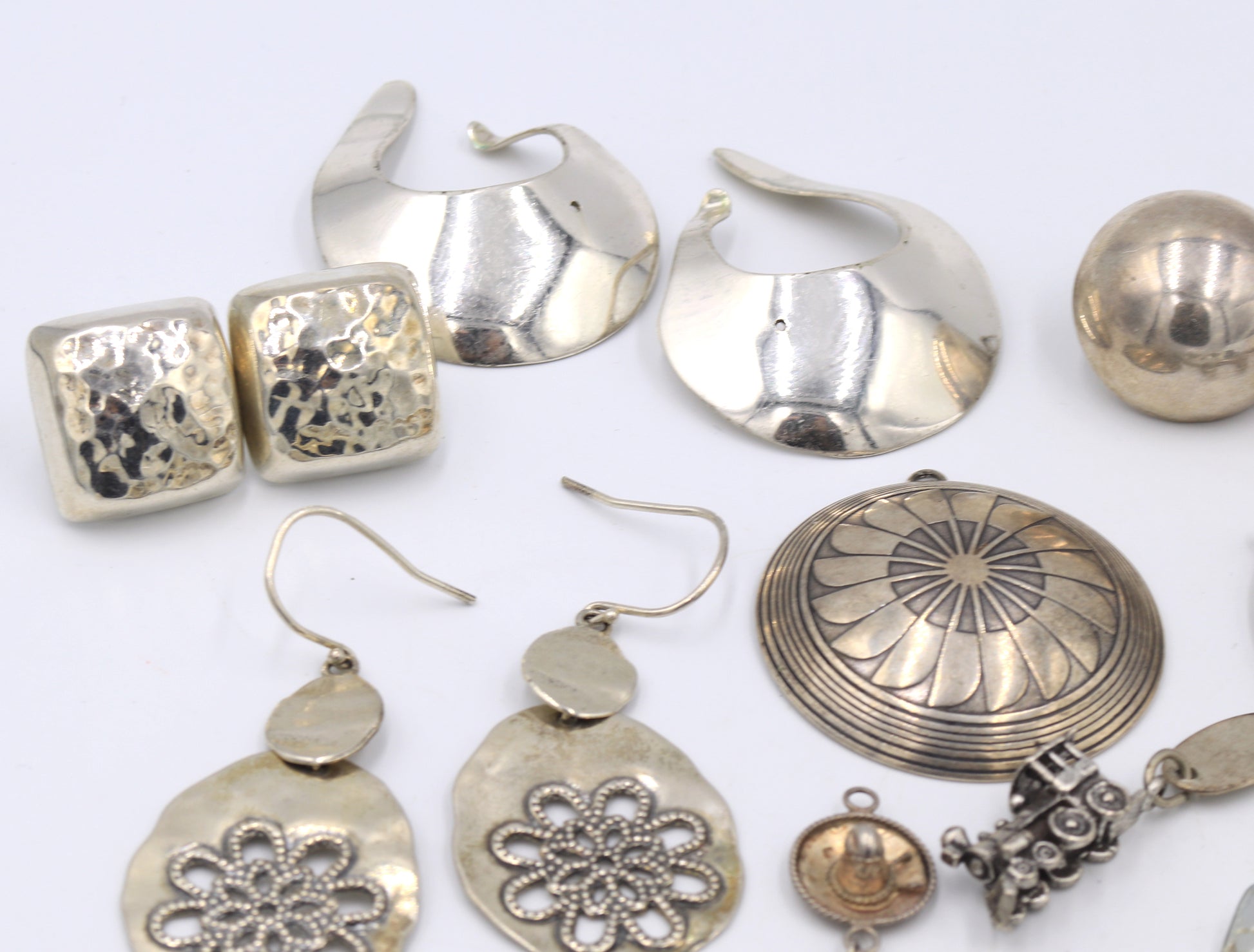 Group lot of Vintage 925 sterling silver charms and earrings