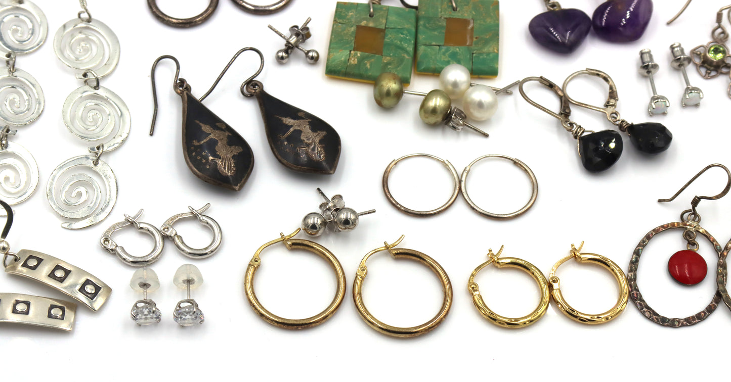 Group lot of vintage 925 sterling silver stud and dangle earrings