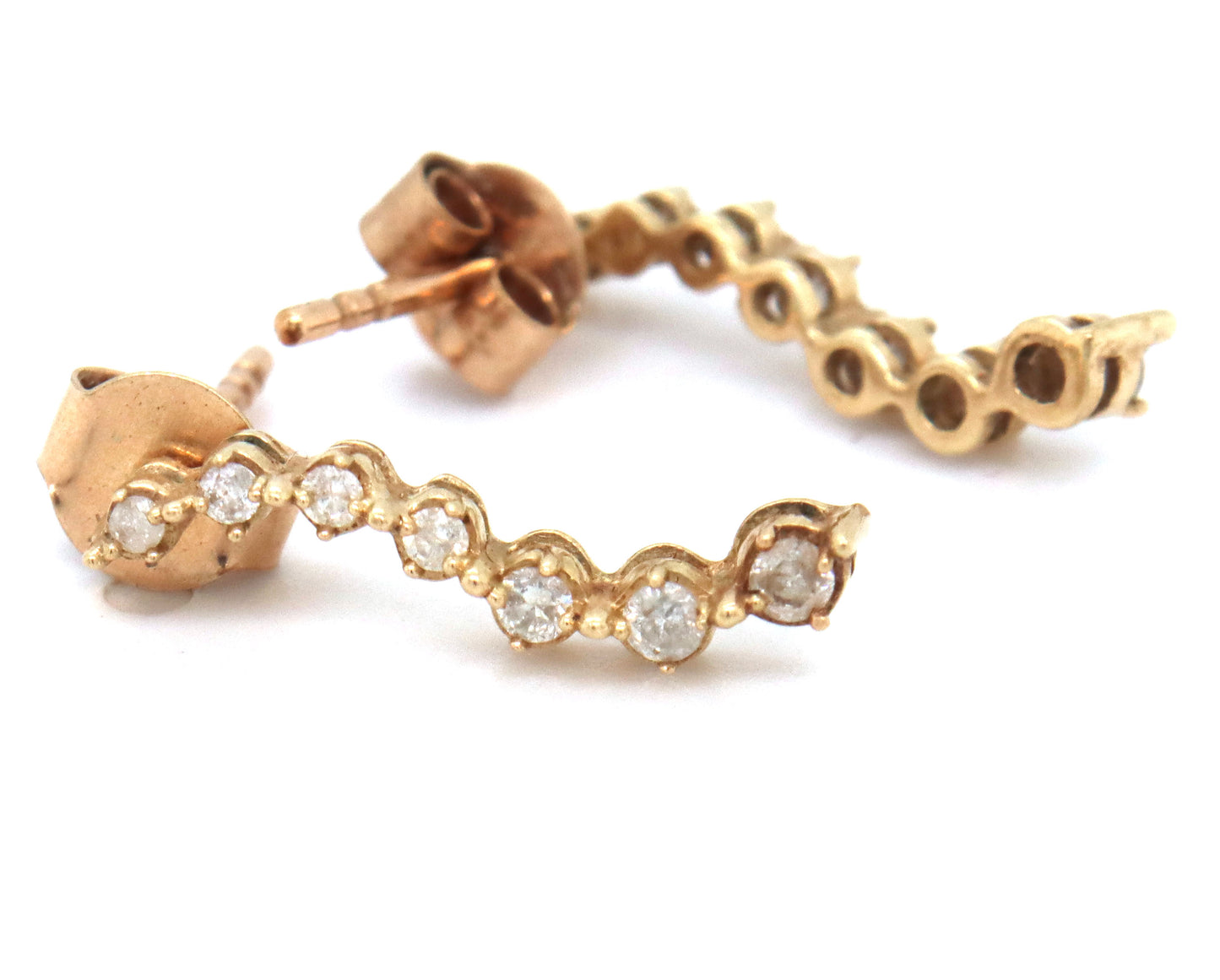 2 Pairs of 10kt diamond earrings