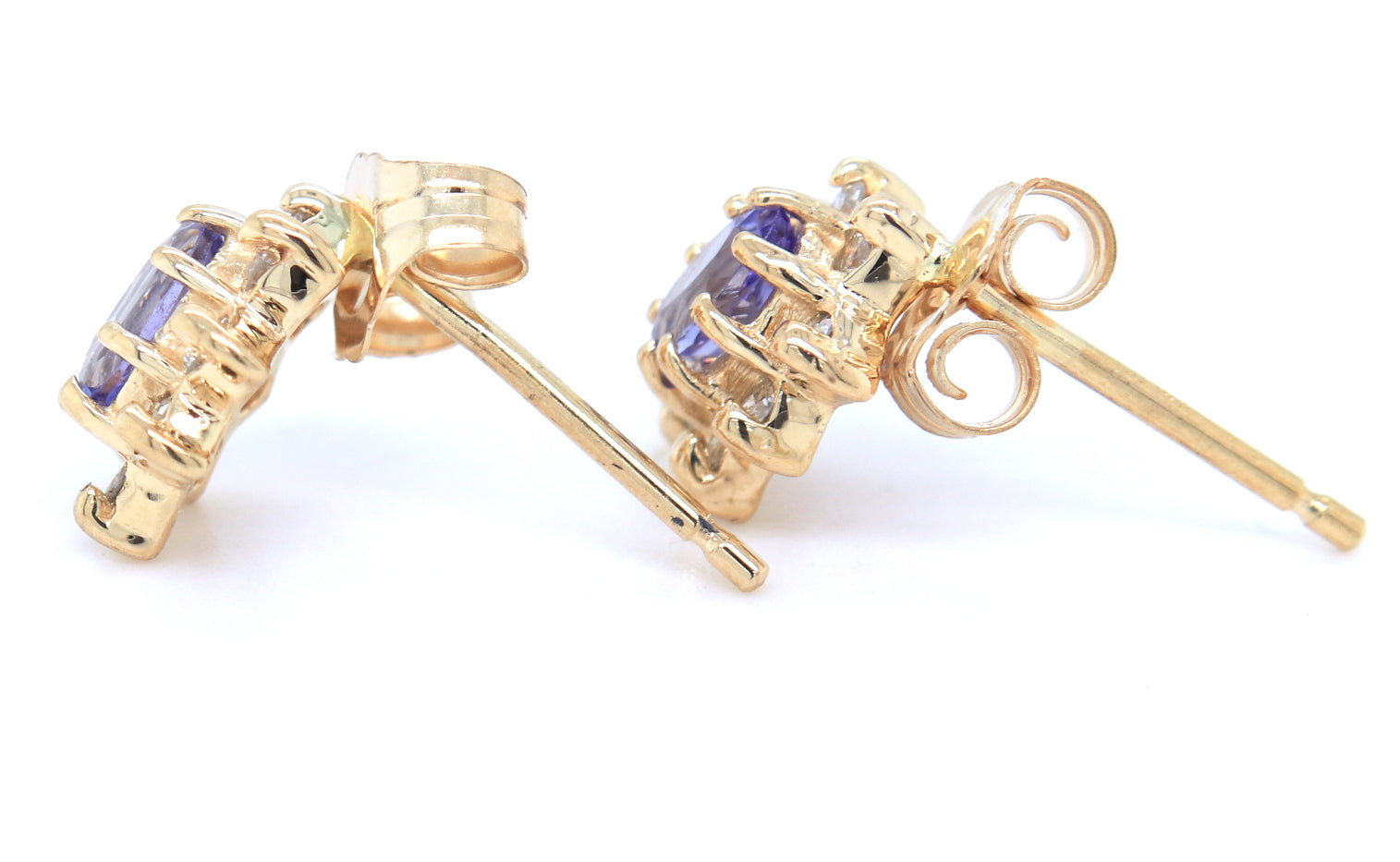 14kt Yellow gold oval Tanzanite and diamond flower earrings