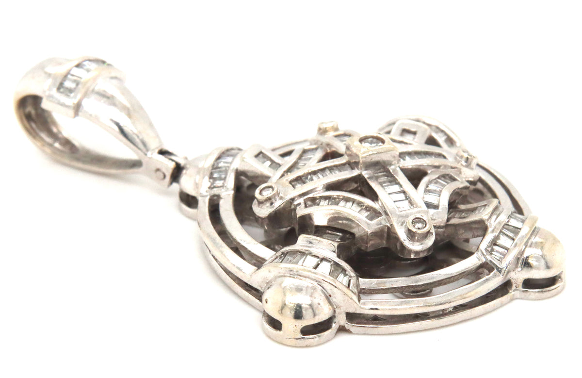 14kt White gold round brilliant and emerald cut diamond pendant