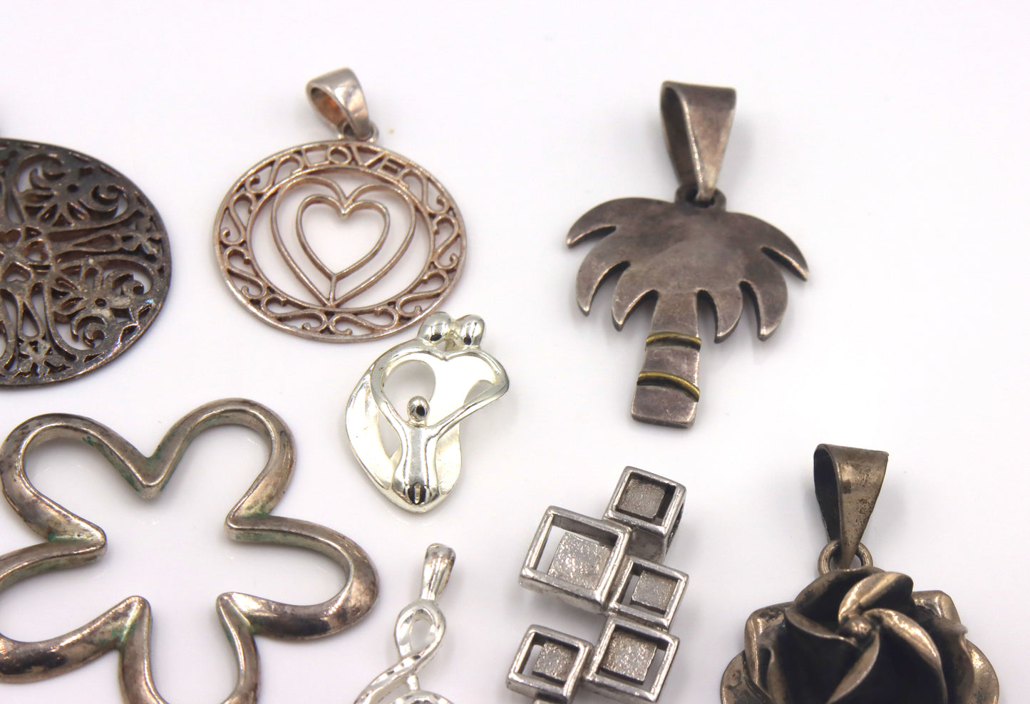 Lot of vintage 925 sterling silver pendants