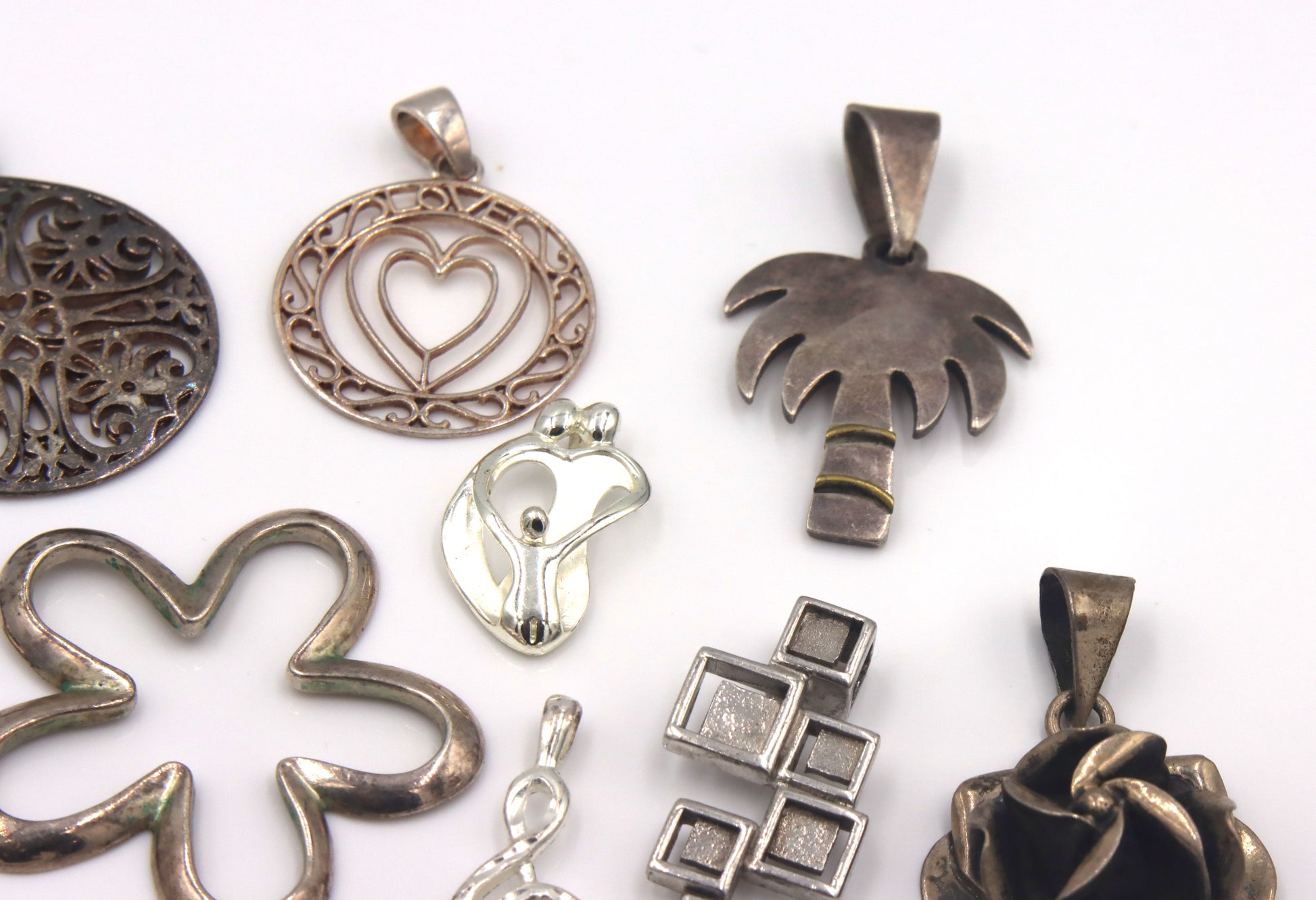 Lot of vintage 925 sterling silver pendants