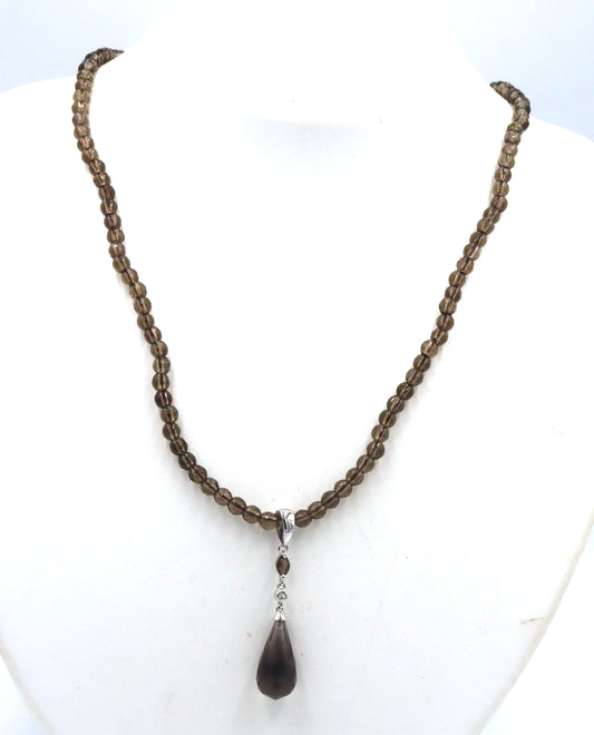 Pear shaped smokey quartz pendant on beaded necklace