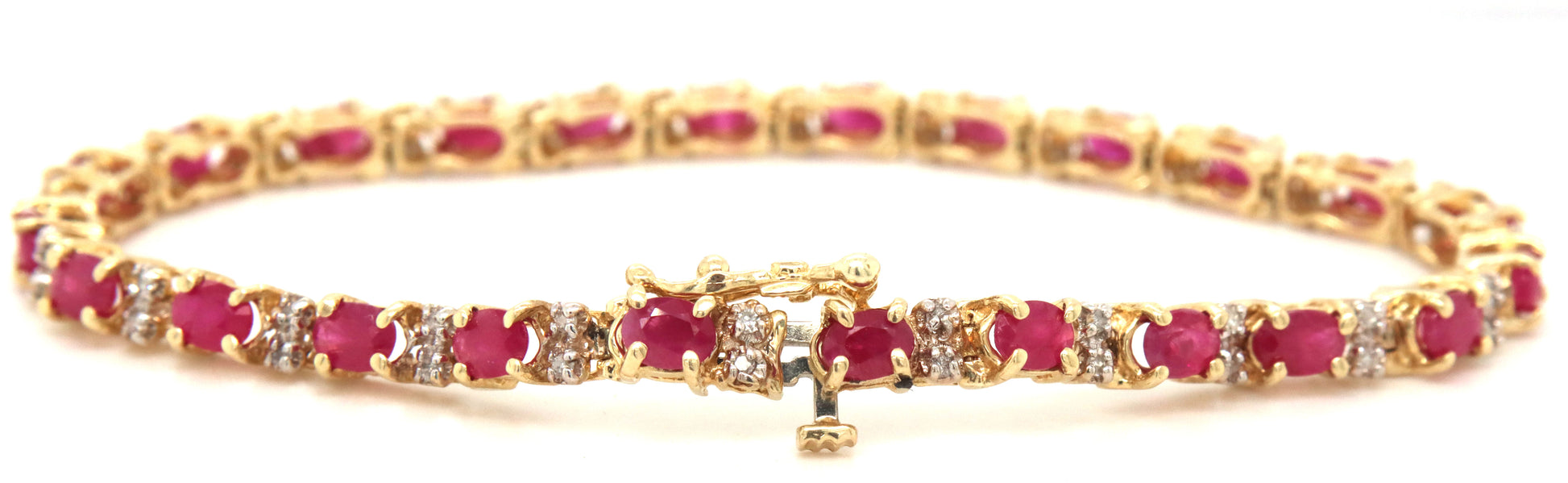 14kt Yellow gold ruby and diamond link bracelet