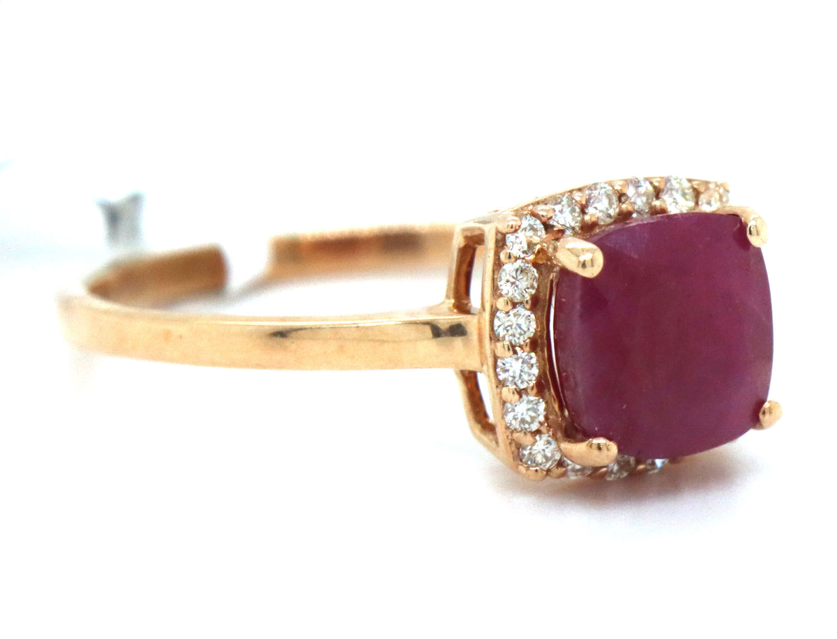 10kt Yellow gold cushion cut ruby and diamond halo ring