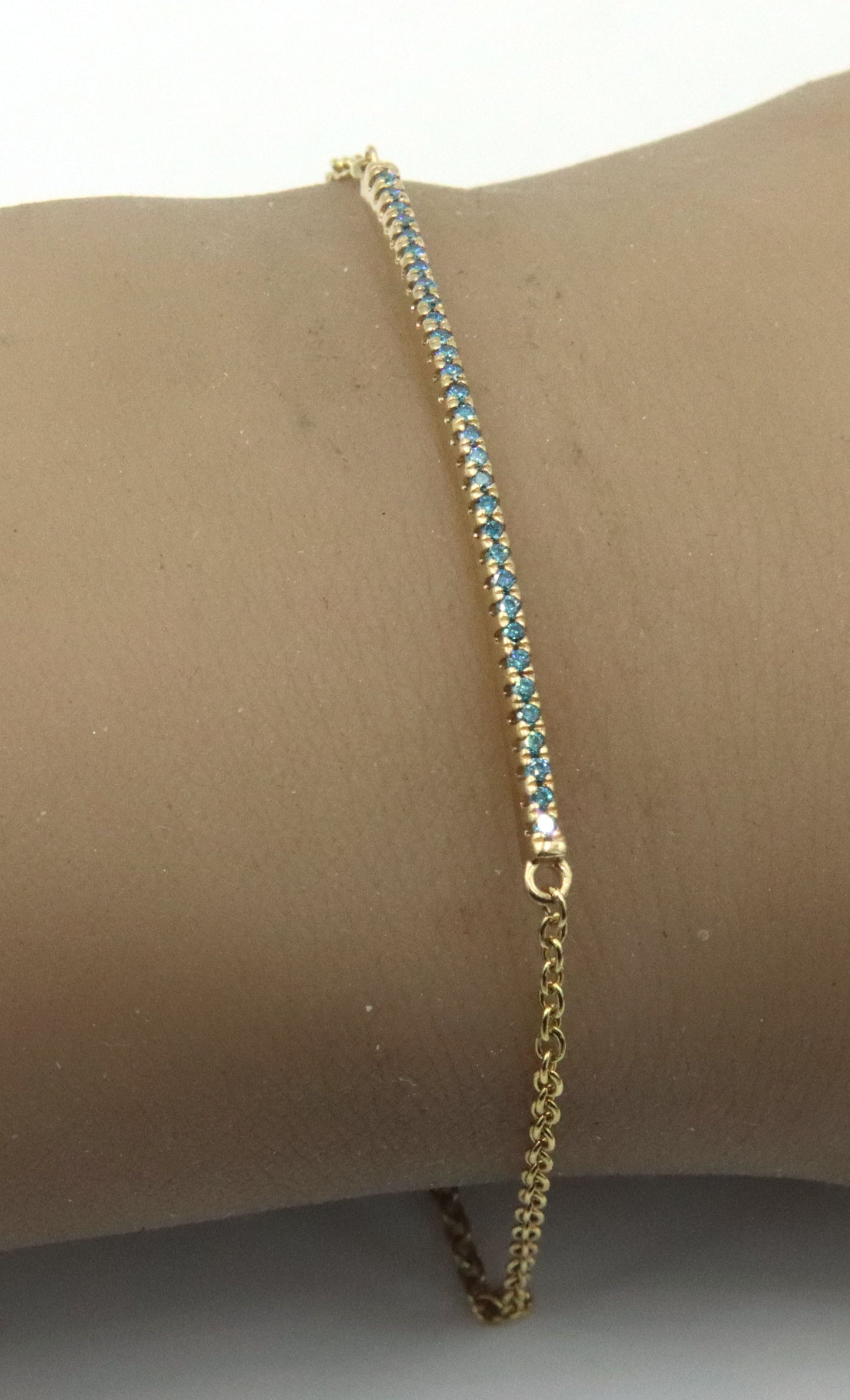 14kt Yellow gold angara Enhanced blue diamond bar bracelet
