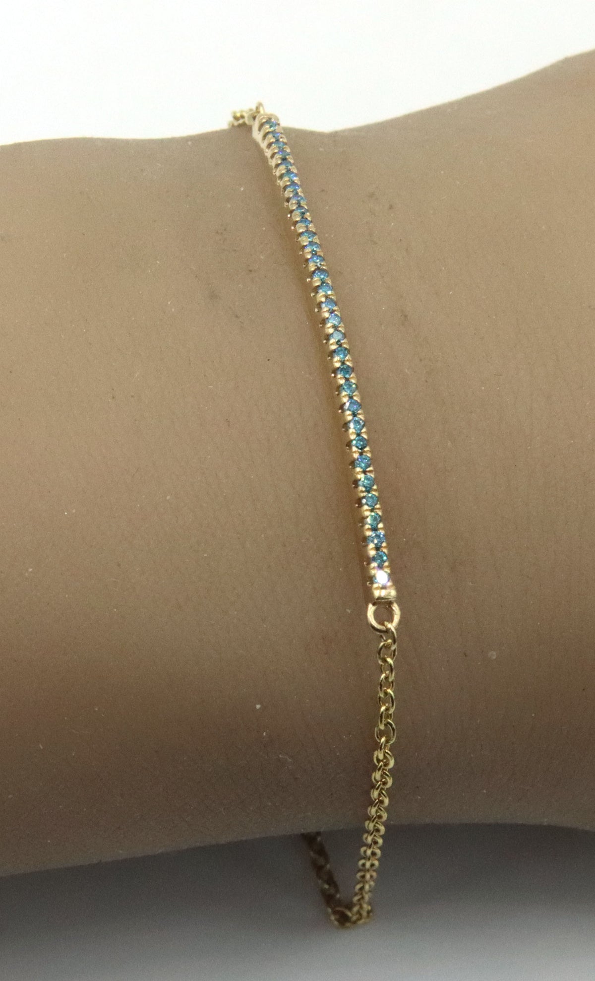14kt Yellow gold angara Enhanced blue diamond bar bracelet