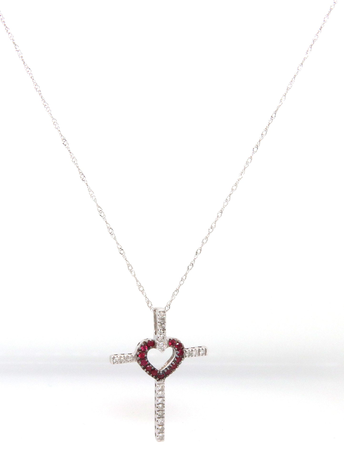 14kt White gold ruby and diamond heart cross pendant on chain