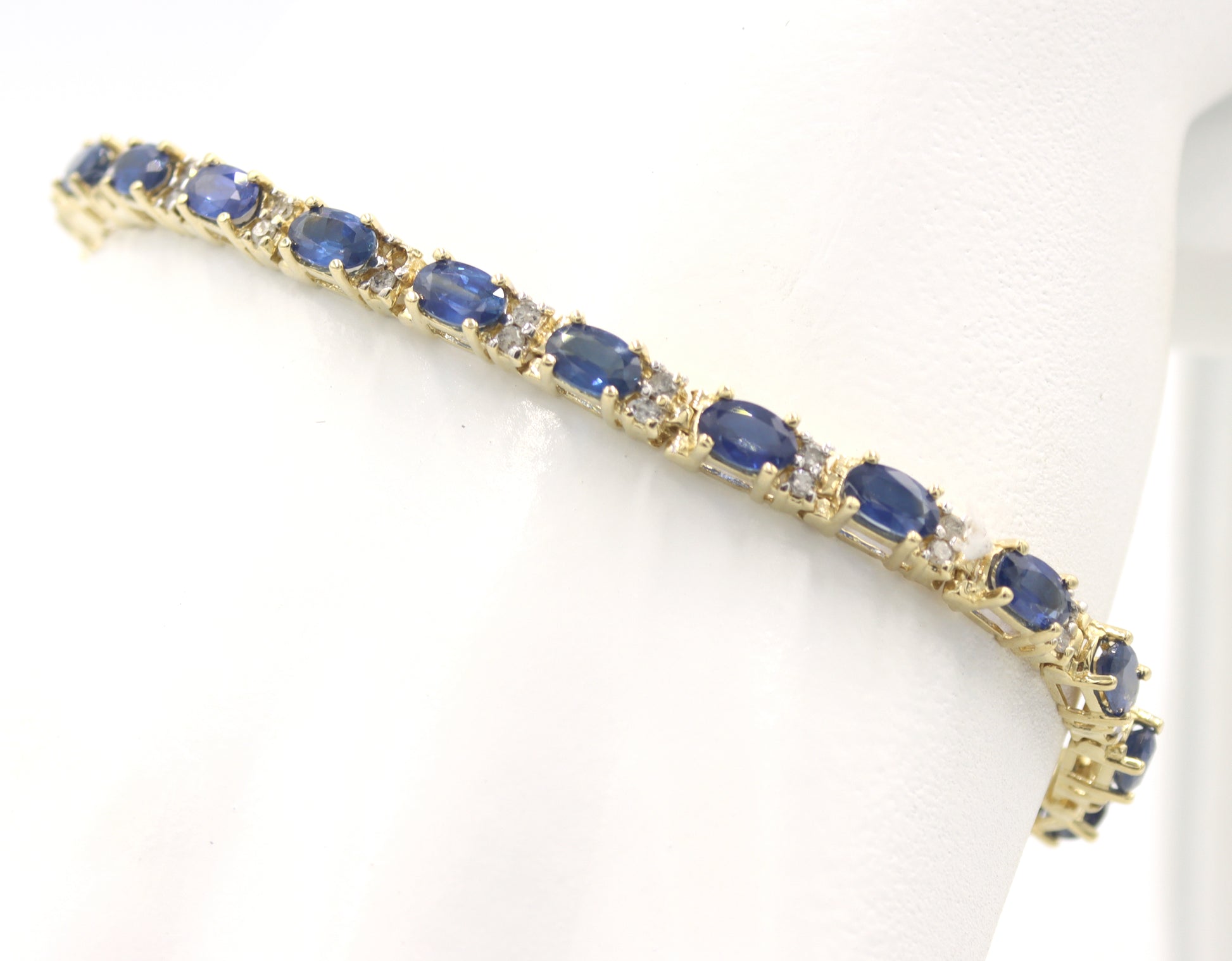 14kt Yellow gold blue sapphire and diamond tennis bracelet