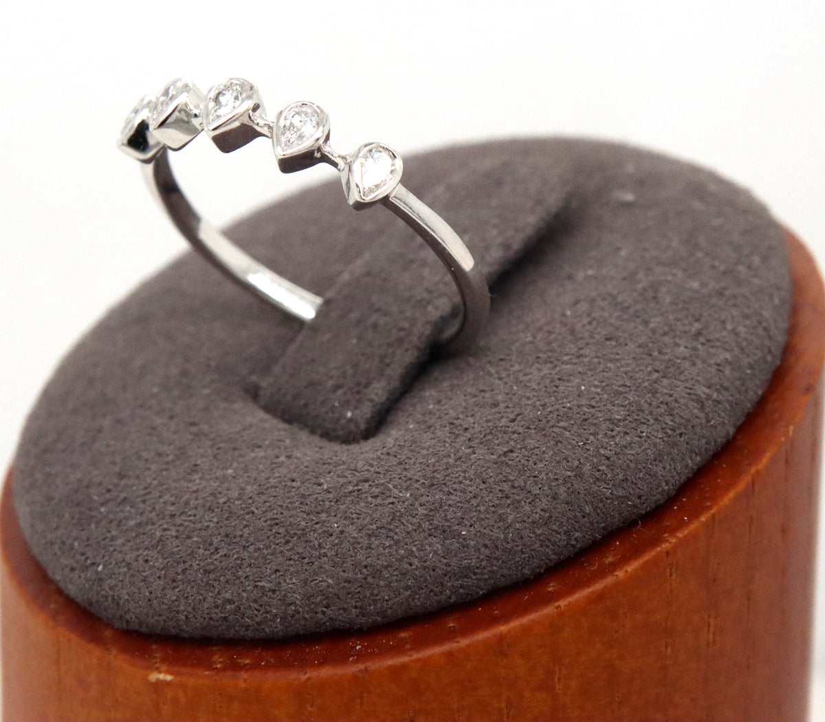 14kt White gold pear shaped bezel set diamond ring