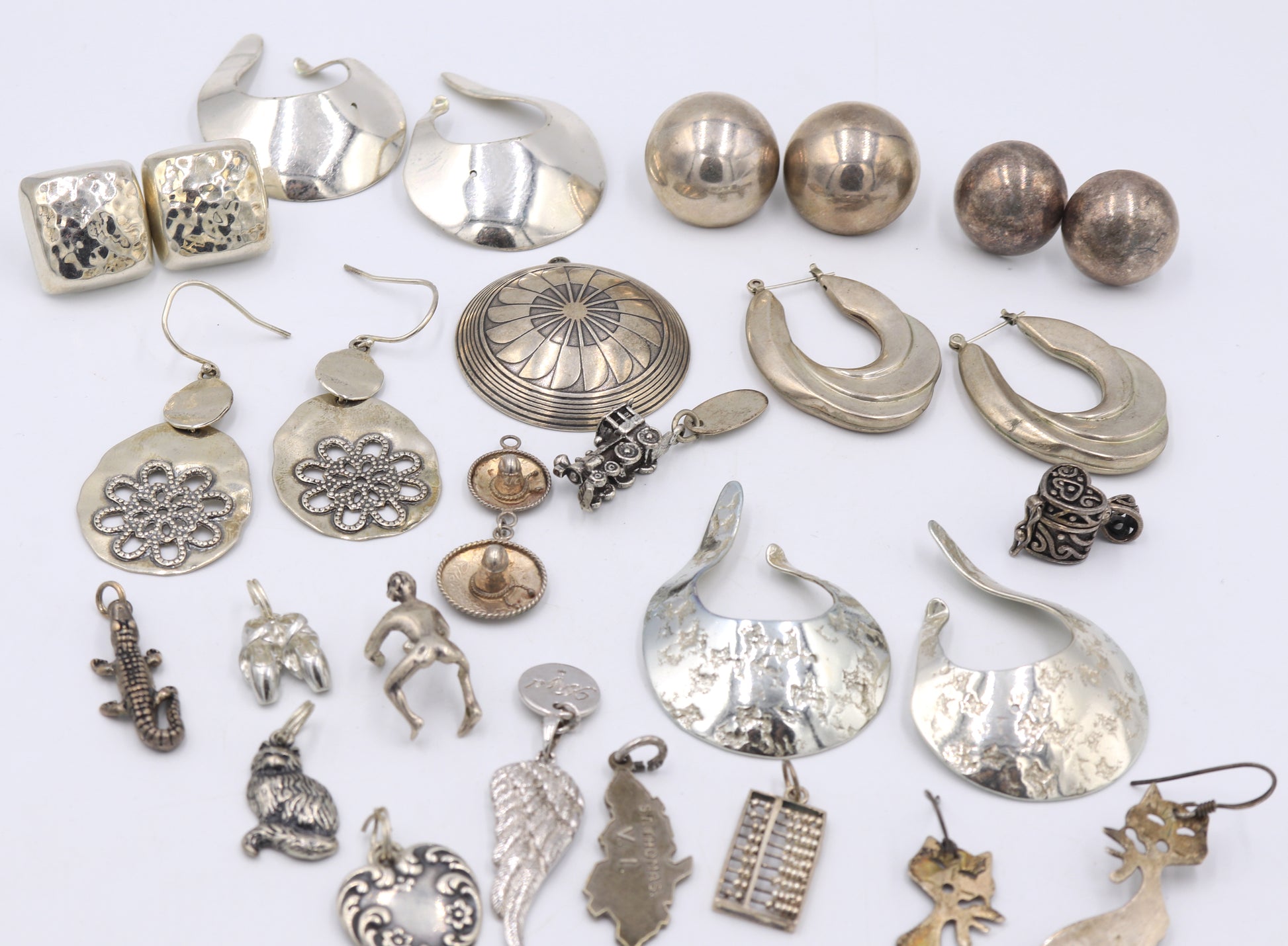Group lot of Vintage 925 sterling silver charms and earrings