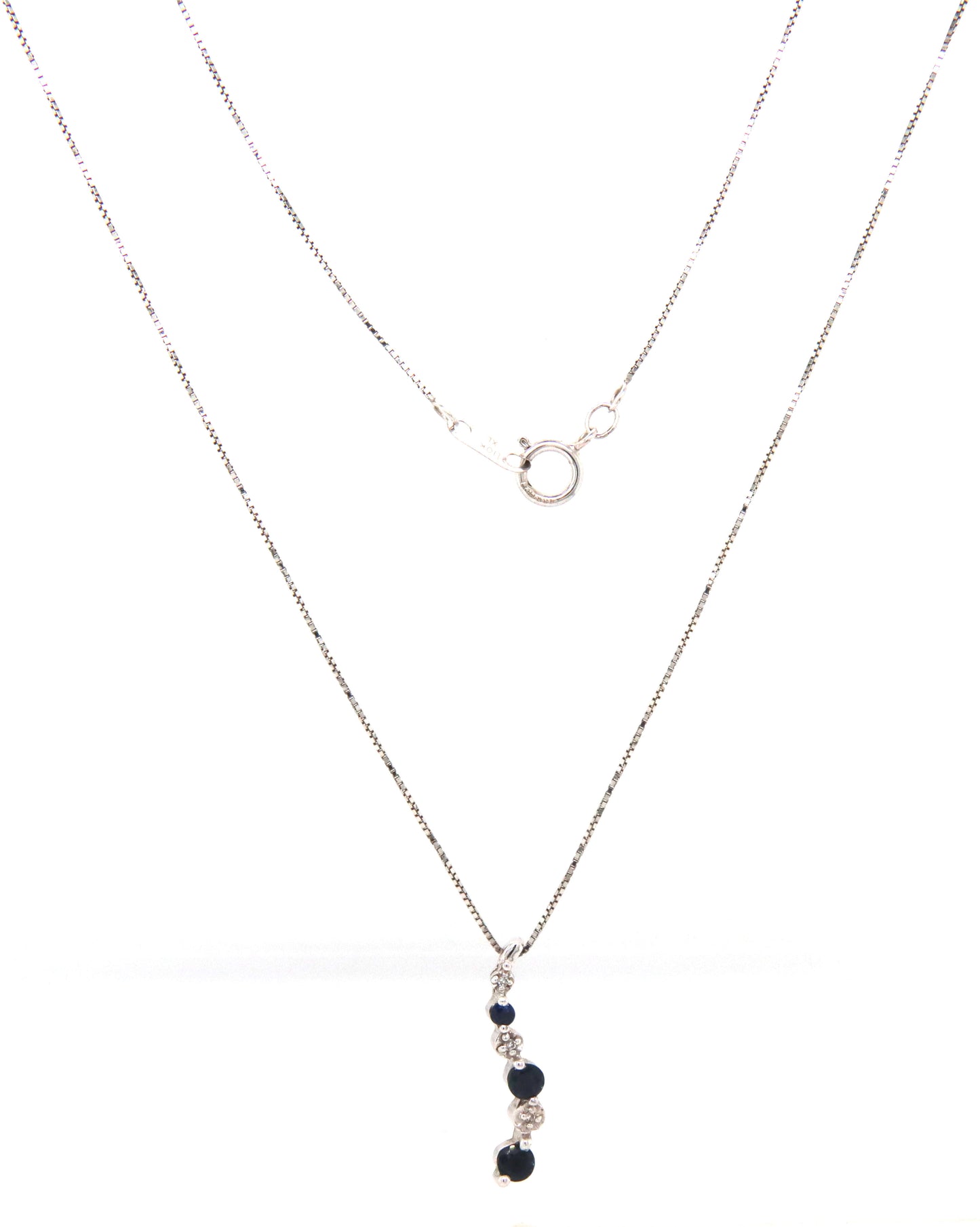 10kt White gold blue sapphire and diamond pendant on chain