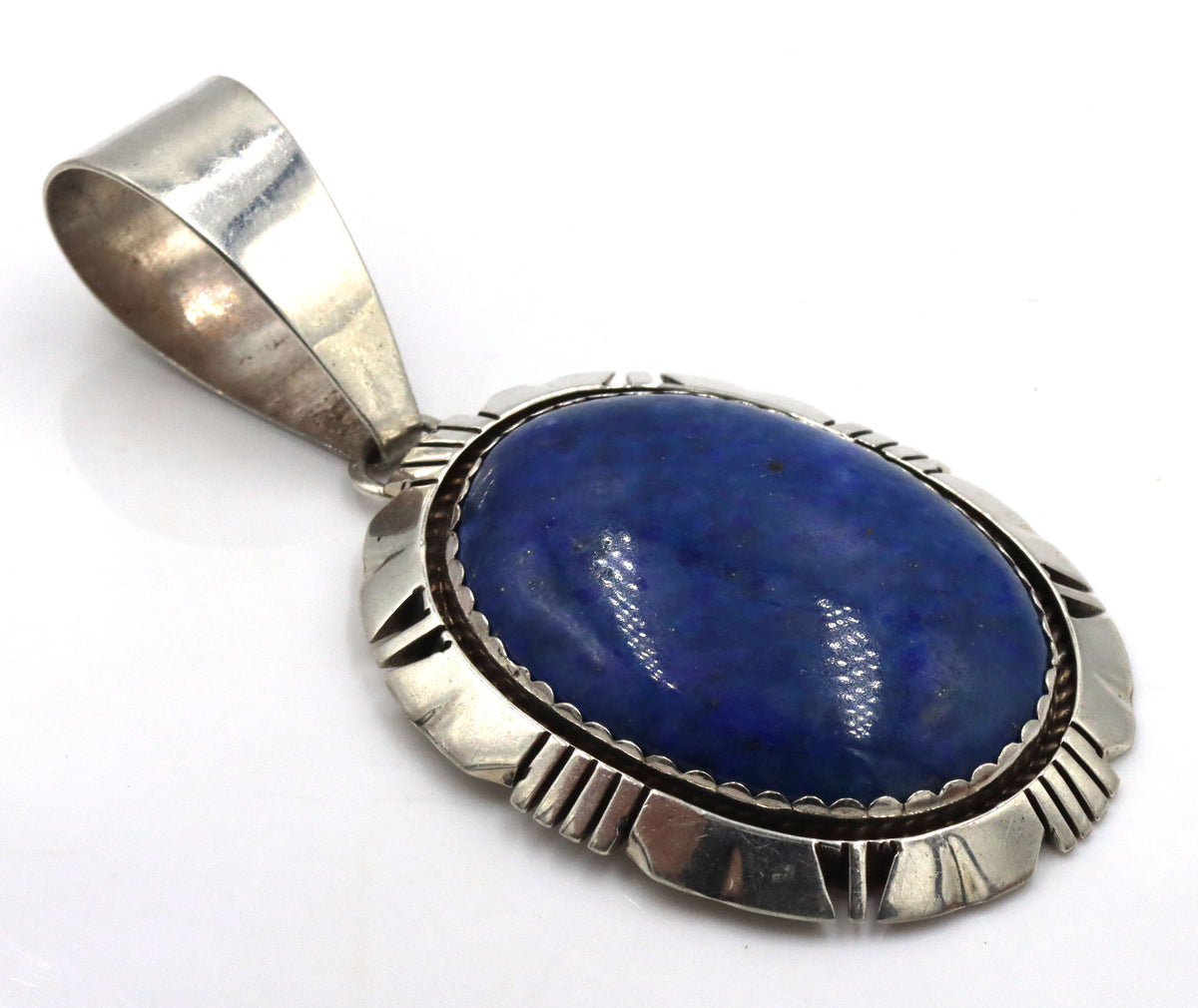 925 Stereling Silver Southwestern Style Large Oval Lapis Lazuli  With A twisted Wire  And Notched Si