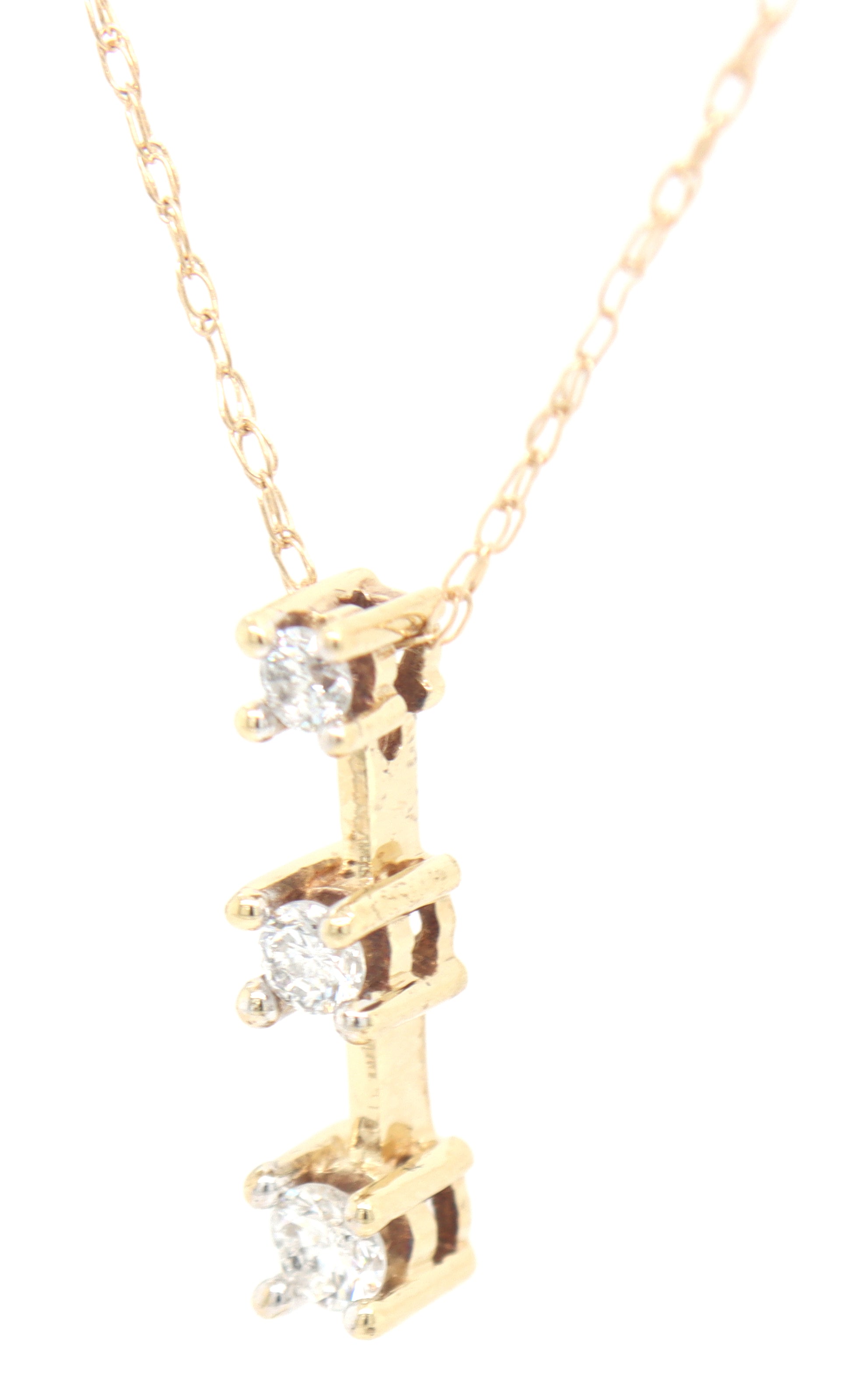 10kt Yellow gold 0.20ctw 3 stone diamond bar pendant on chain