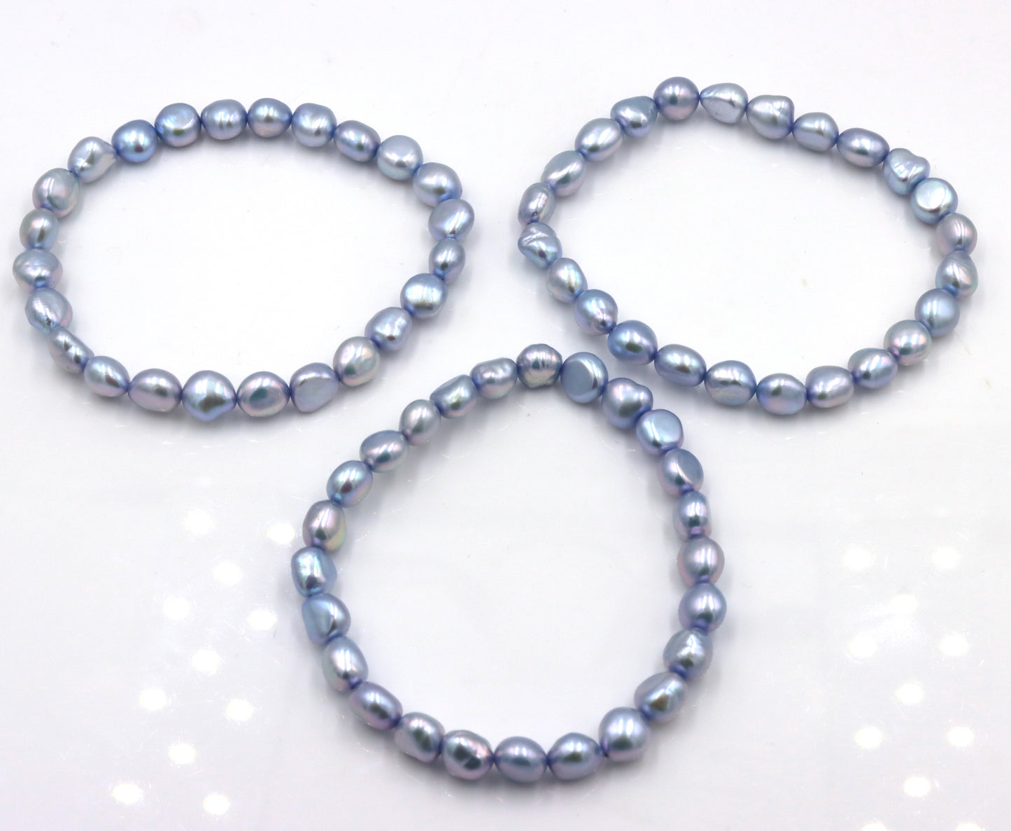 3 Lot of pearl bracelets