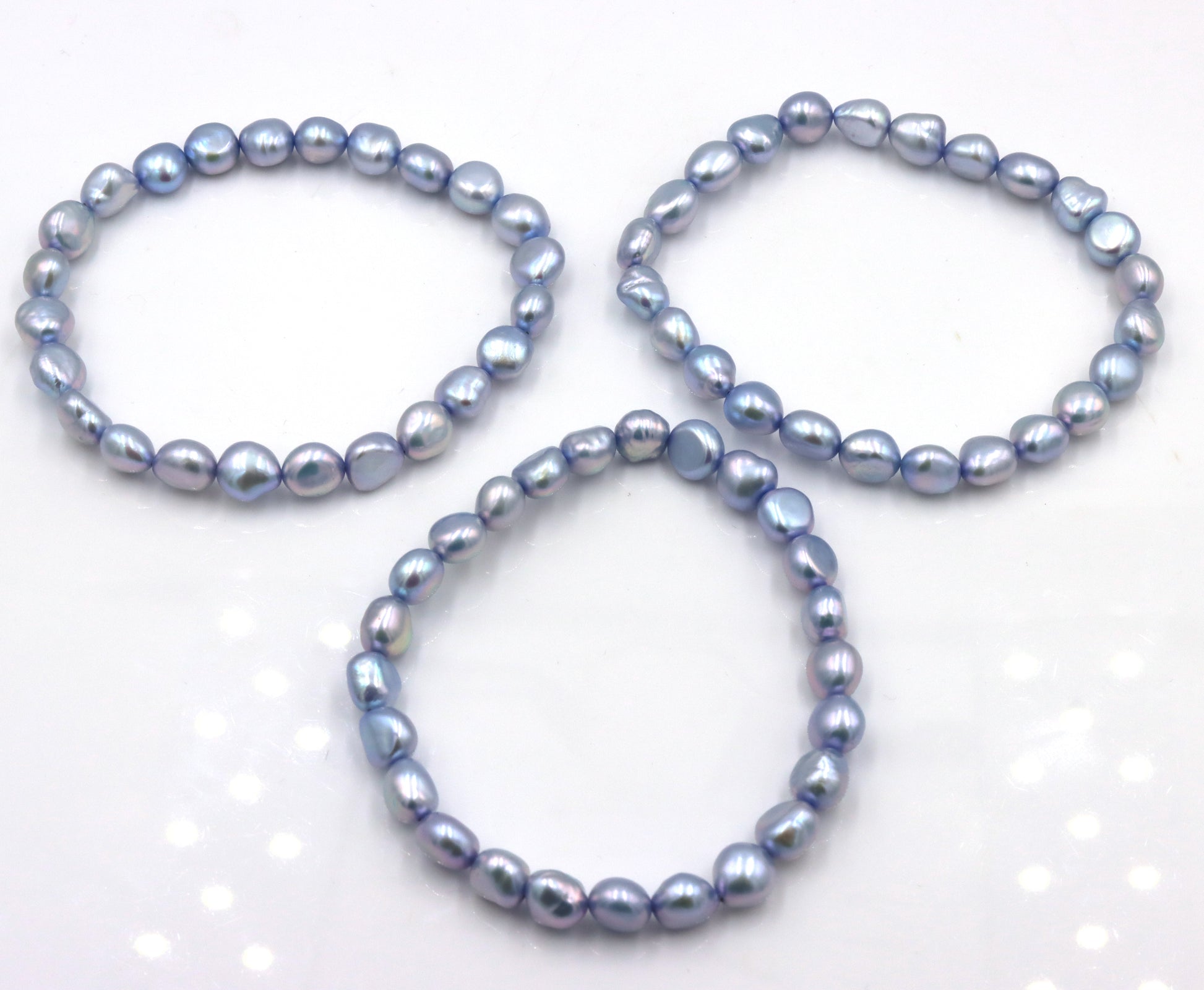 3 Lot of pearl bracelets