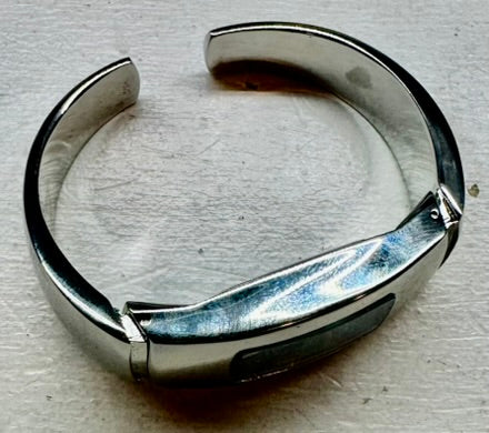 Modern Stainless Steel Blue Dial Cuff Watch Sleek Contemporary Design