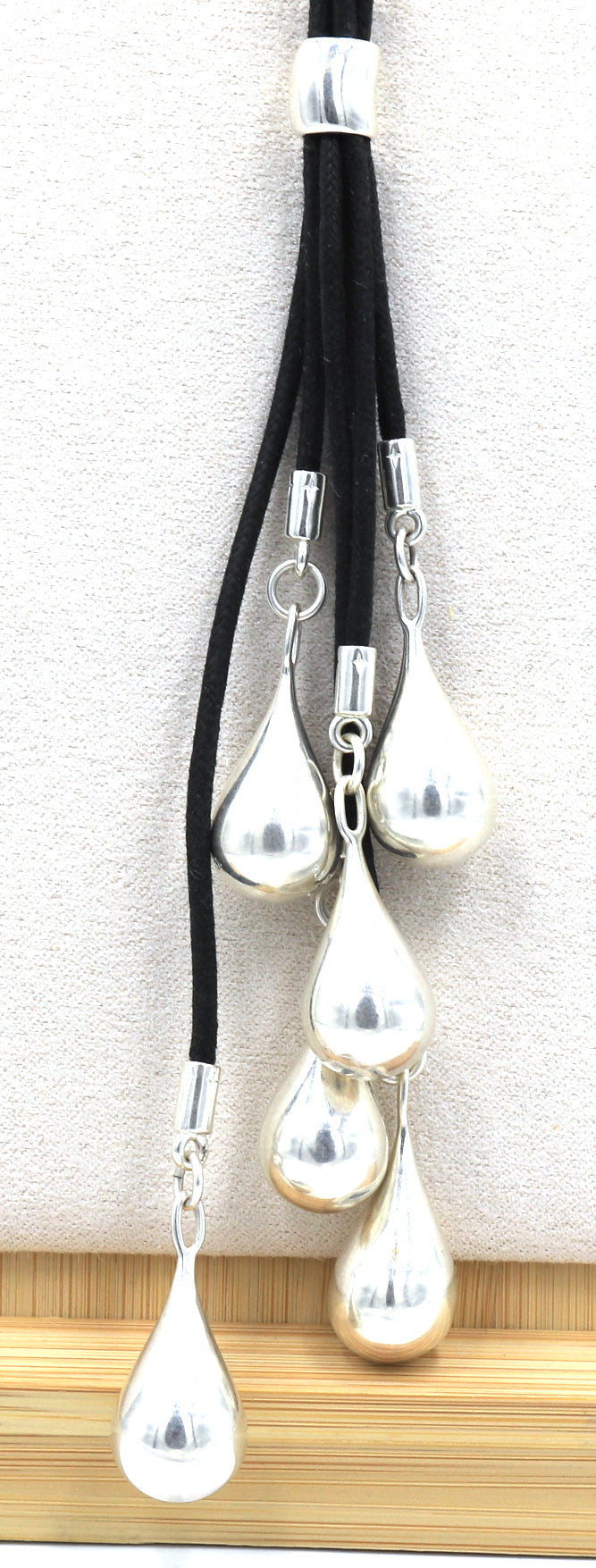 925 Sterling silver signed tear drop pendant on multi strand black cord necklace