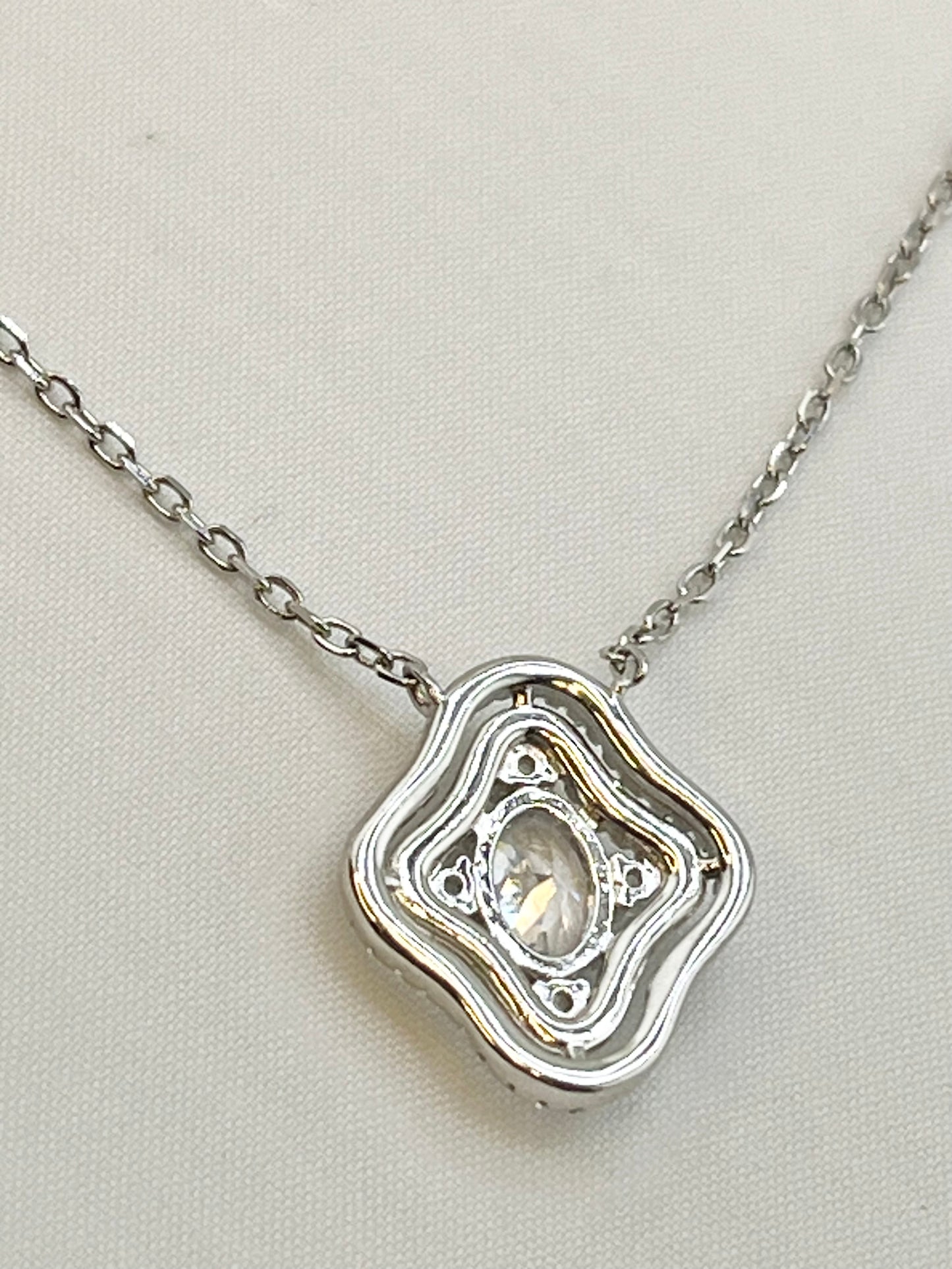 925 Sterling Silver Oval Shape Center Crystal Pendant With Doble Halo Design Necklace