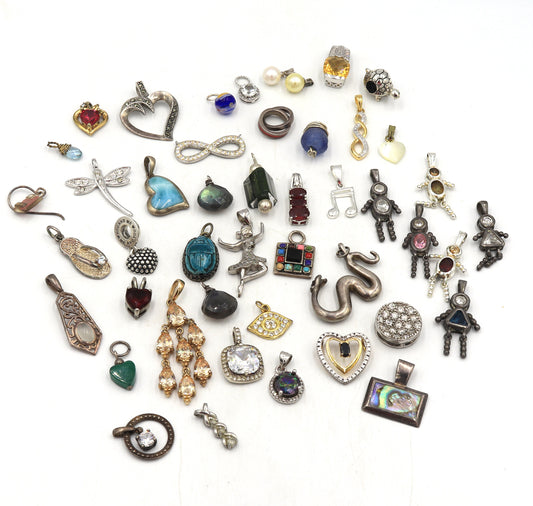 Group lot of vintage 925 sterling silver pendants and charms