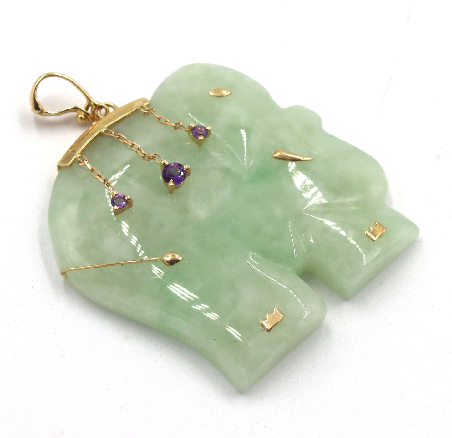 Lot of 14kt yellow gold green jade pendants