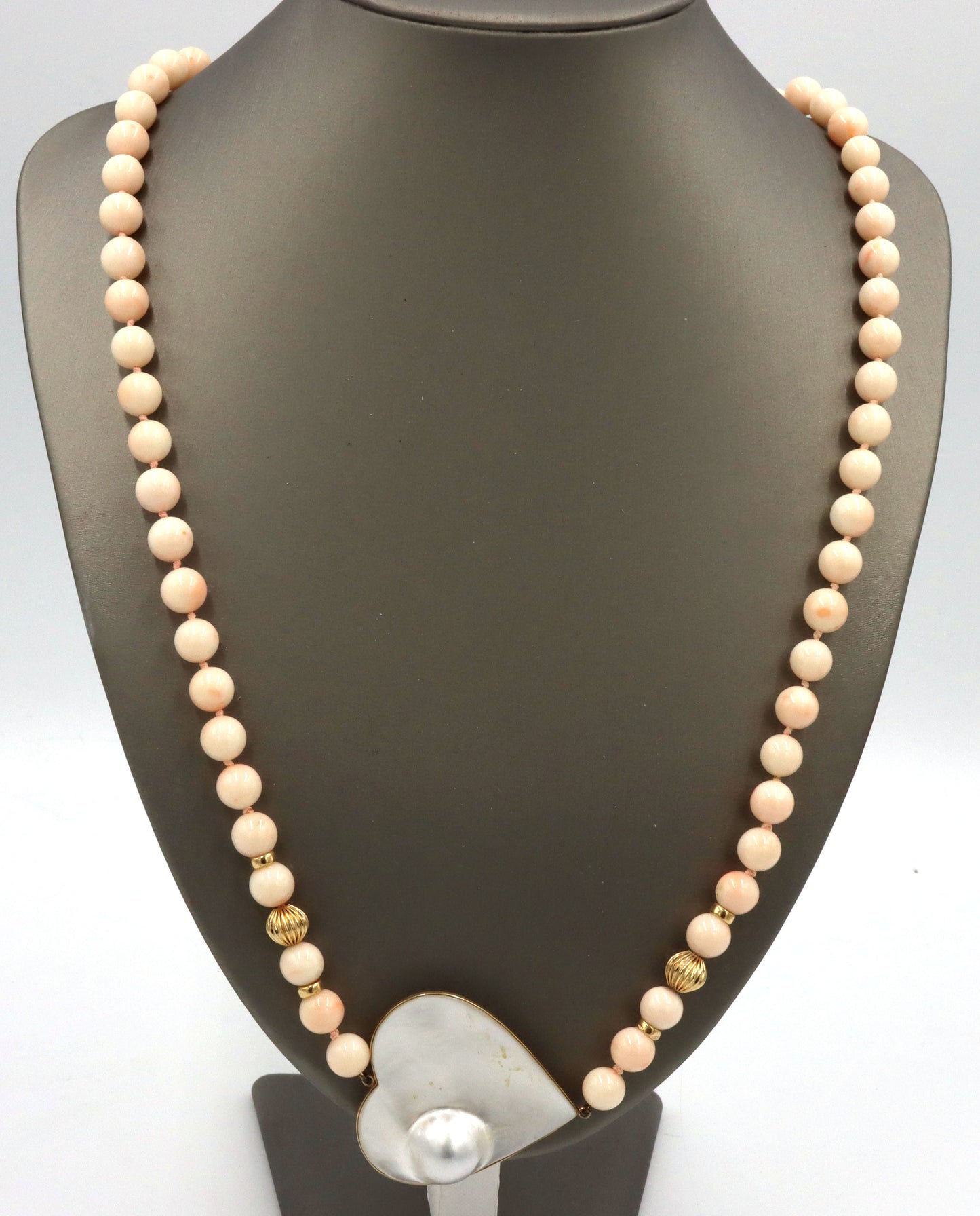 Pink quartz beaded necklace with mother of pearl heat shaped pendant
