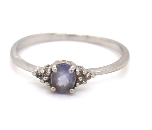 Platinum oval blue star and diamond ring