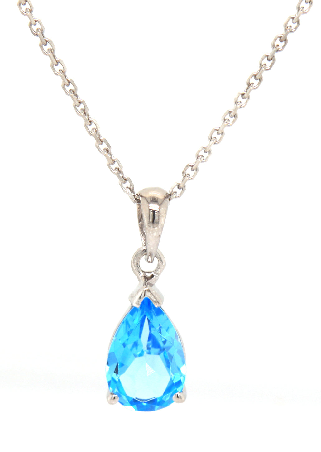 14kt White gold pear shaped blue topaz pendant on chain necklace