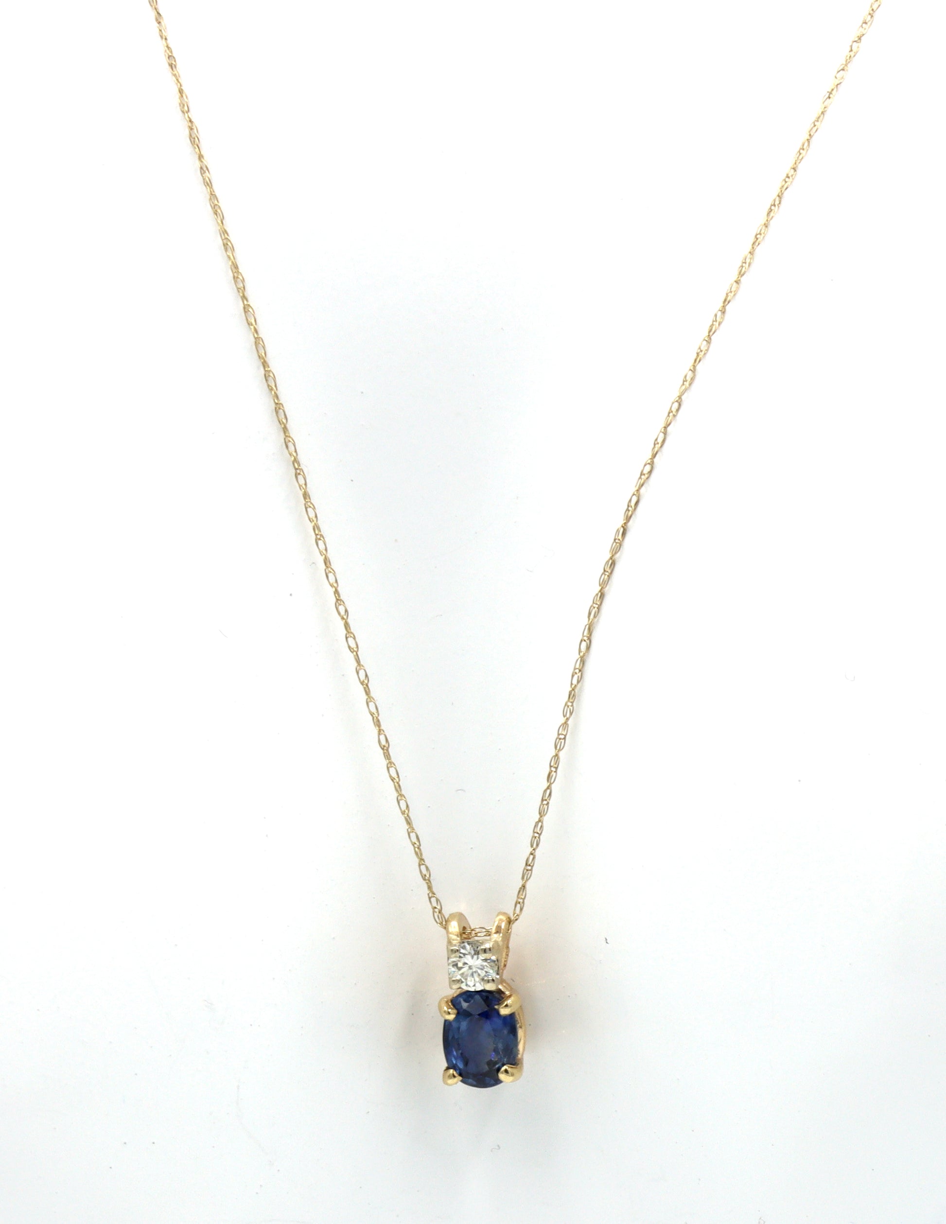 10kt Yellow gold 1.10ct oval sapphire and diamond pendant on chain