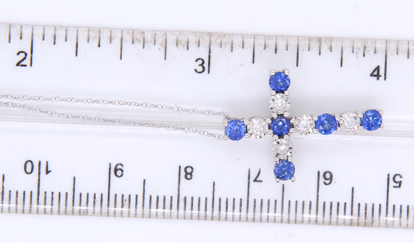 Fantastic White Gold Sapphire and Diamond accent Cross Pendant on Chain