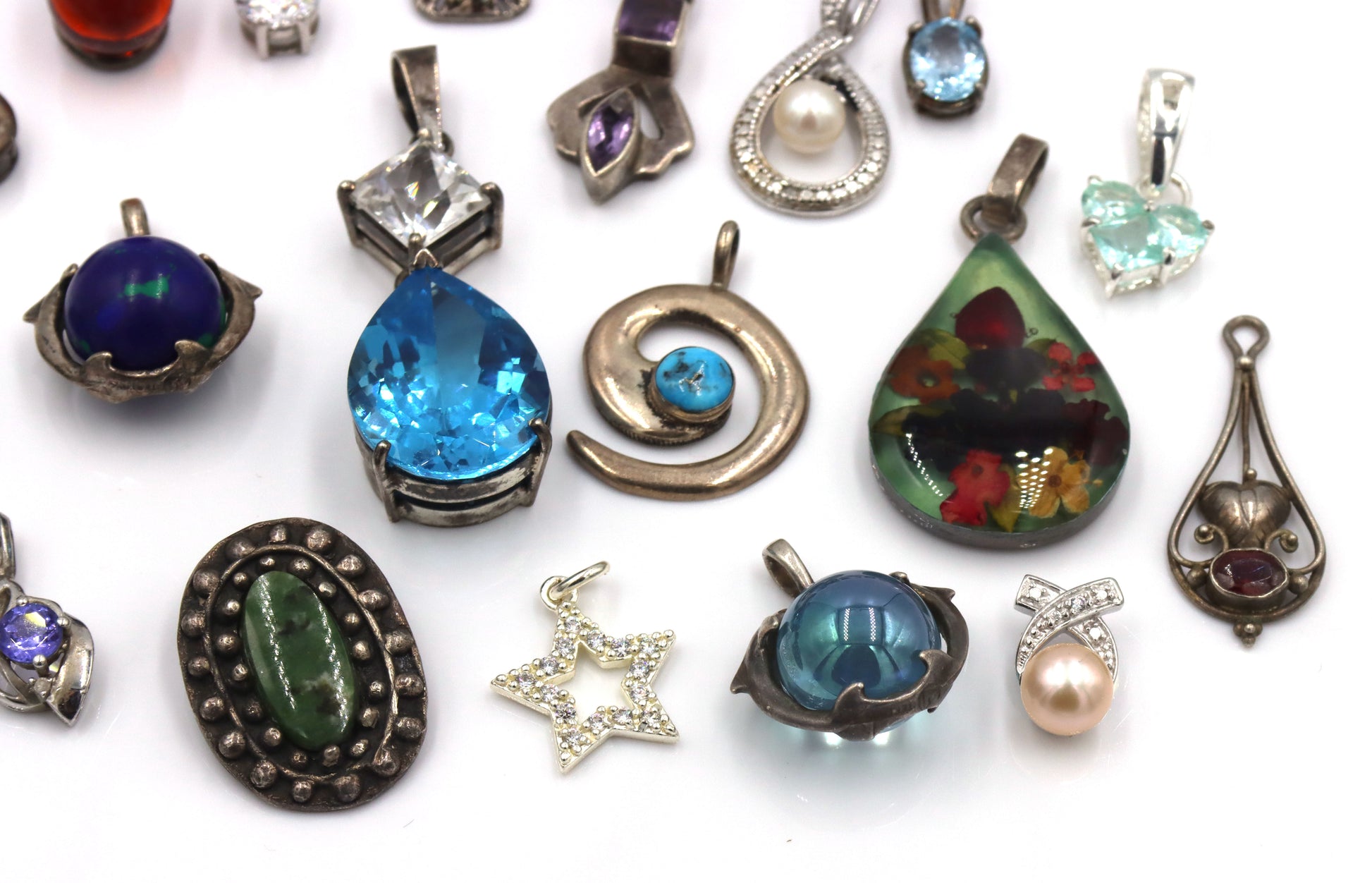 Lot of vintage 925 sterling silver pendants and charms