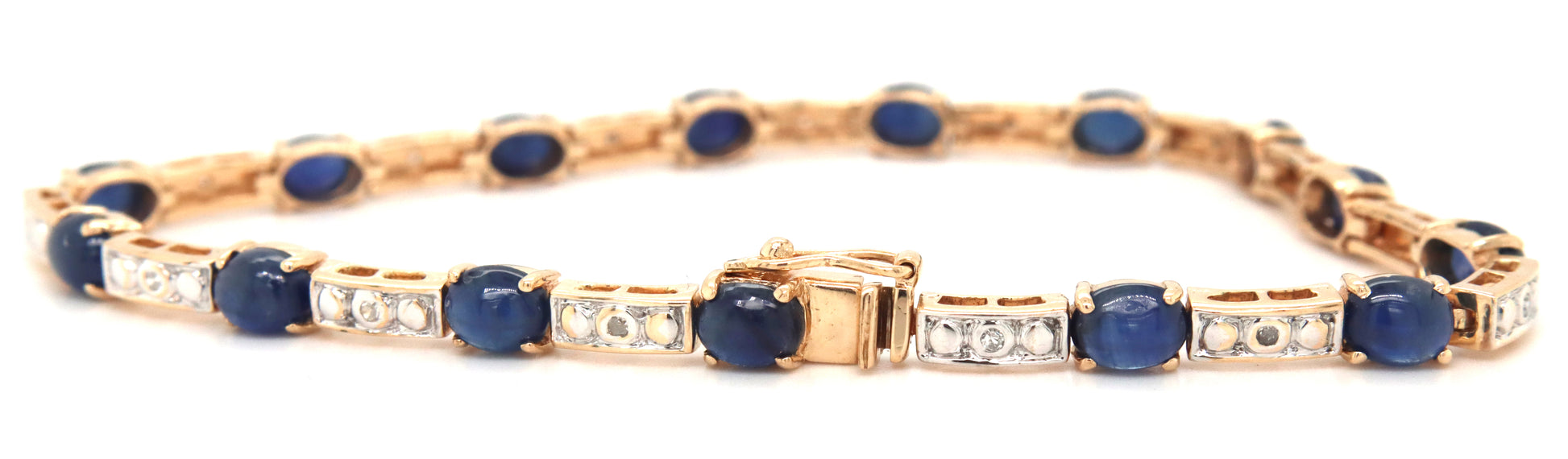 14kt Yellow gold 7.5ctw oval sapphire and diamond accent tennis bracelet