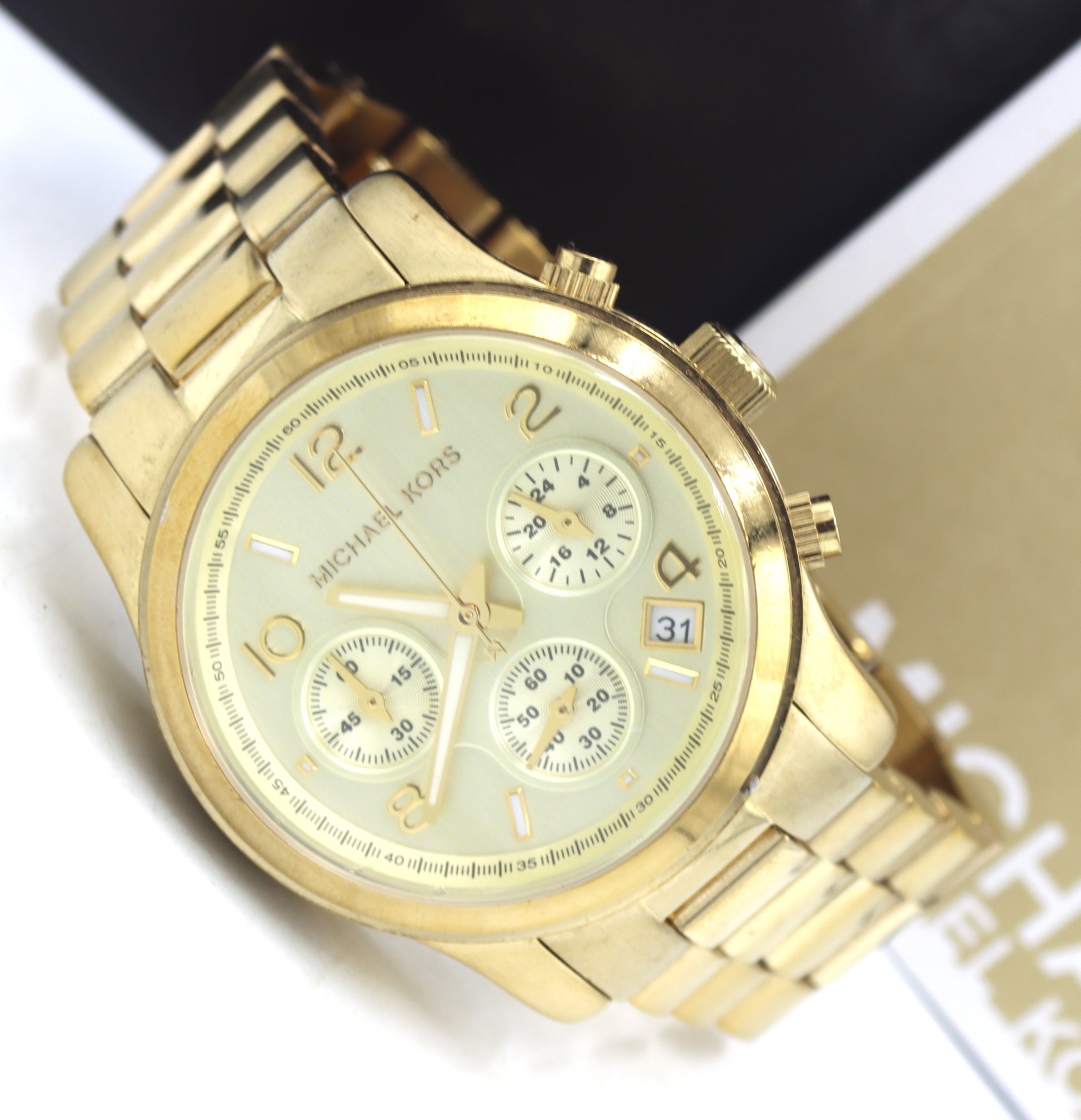 Micheal Kors mid size Chronograph gold tone watch
