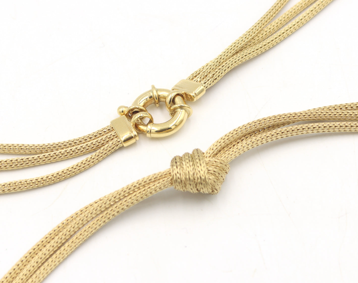 18kt Yellow gold knot pendant on 3 row chain necklace