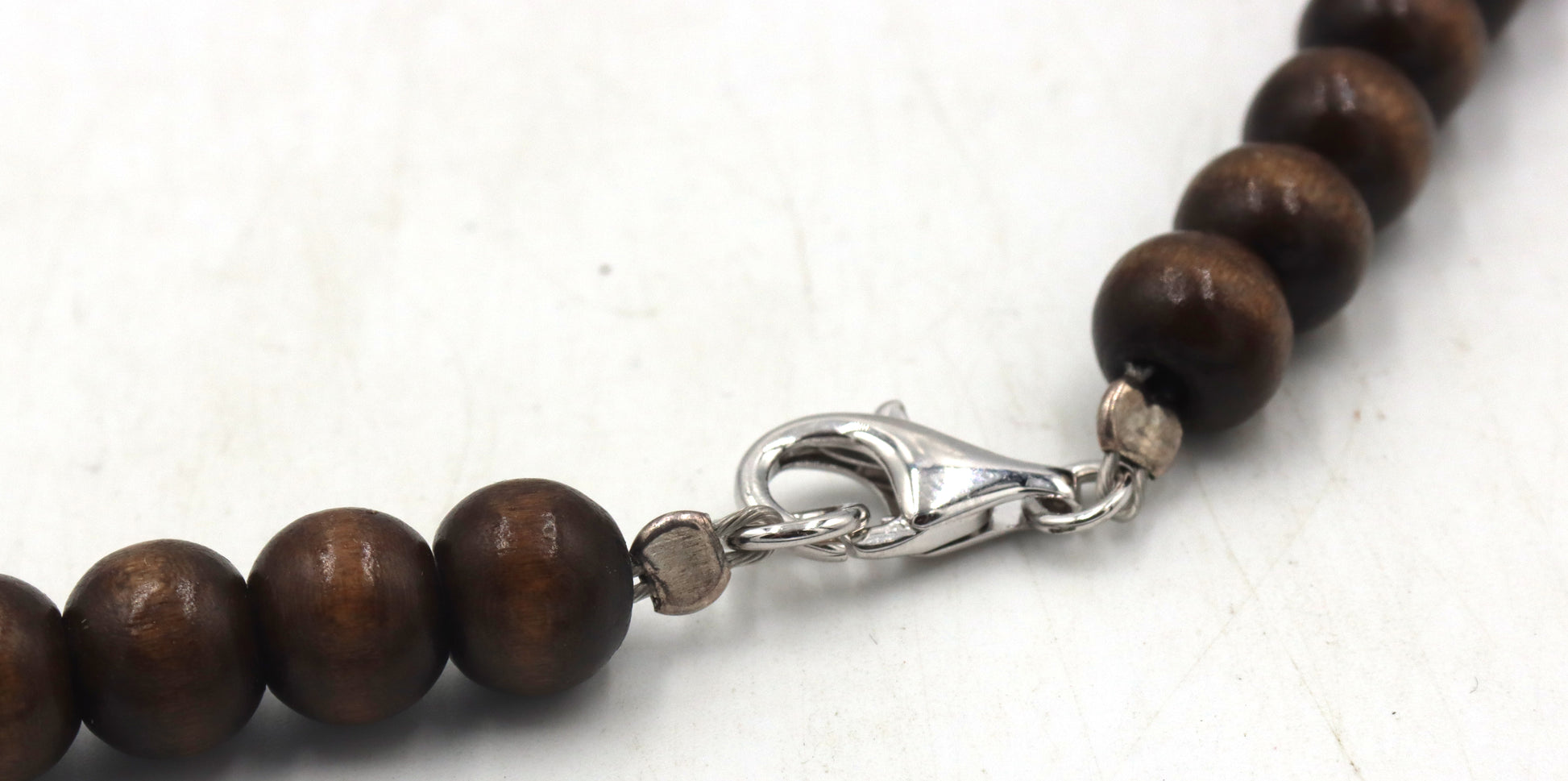 Wooden beads necklace with silver clasp