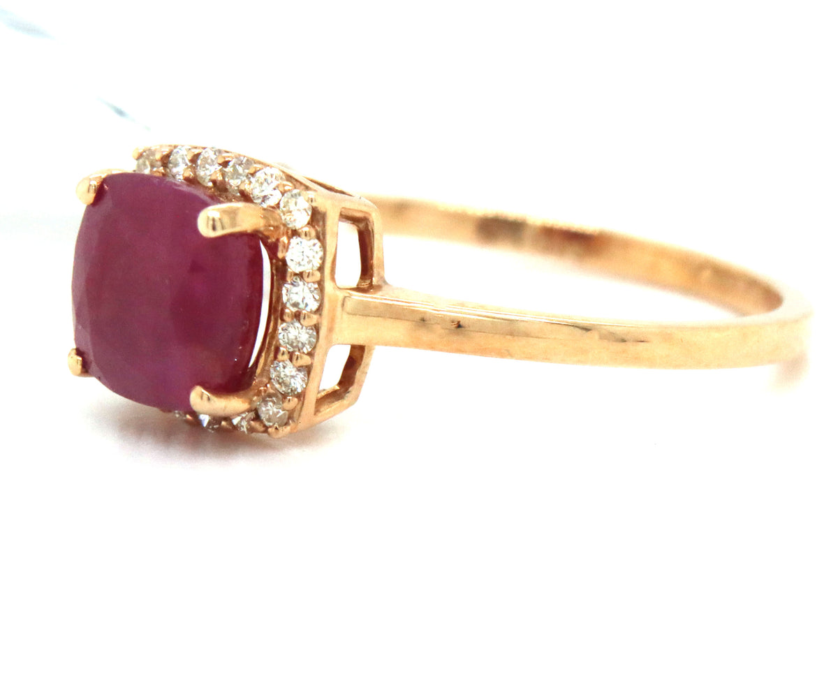 10kt Yellow gold cushion cut ruby and diamond halo ring